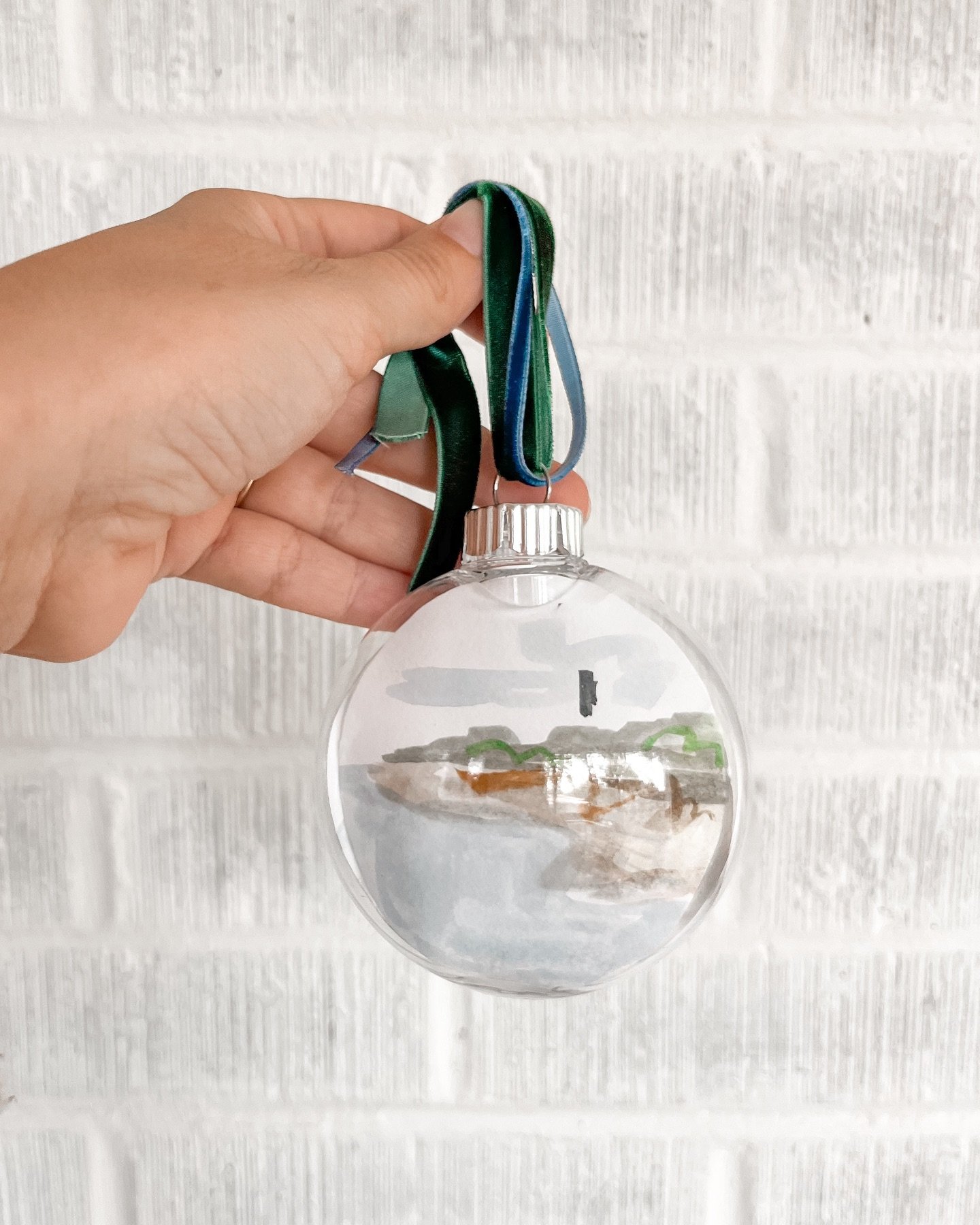 25 ornaments filled with Sullivan&rsquo;s Island watercolors and tied with velvet ribbon are making their way to @artonthebeachchs this weekend! 🎄🤍 If any remain after the event, they&rsquo;ll be placed on my website November 15th (along with any o