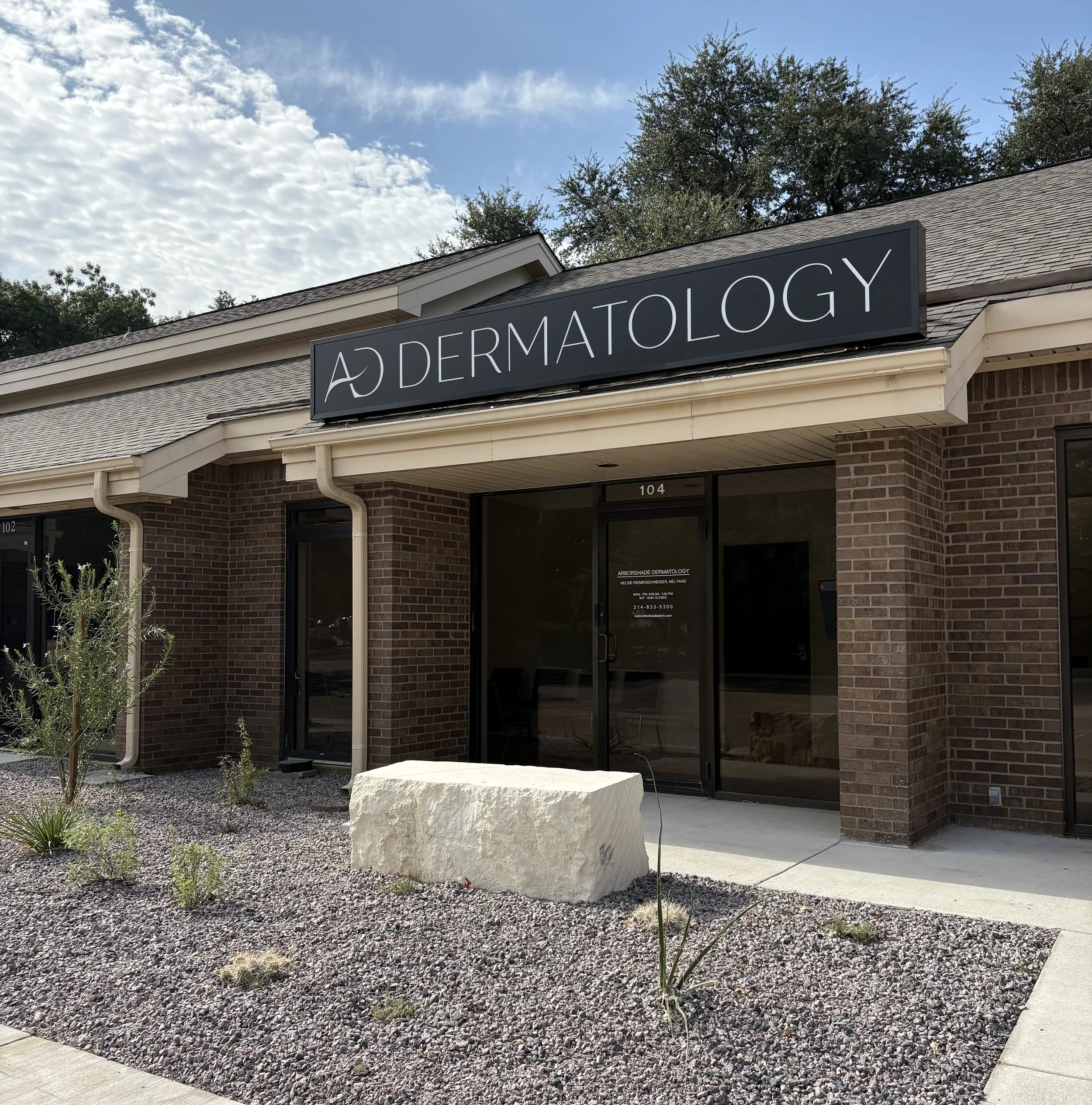 Entrance to Arborshade Dermatology at Suite 104, under a sign that reads AD Dermatology