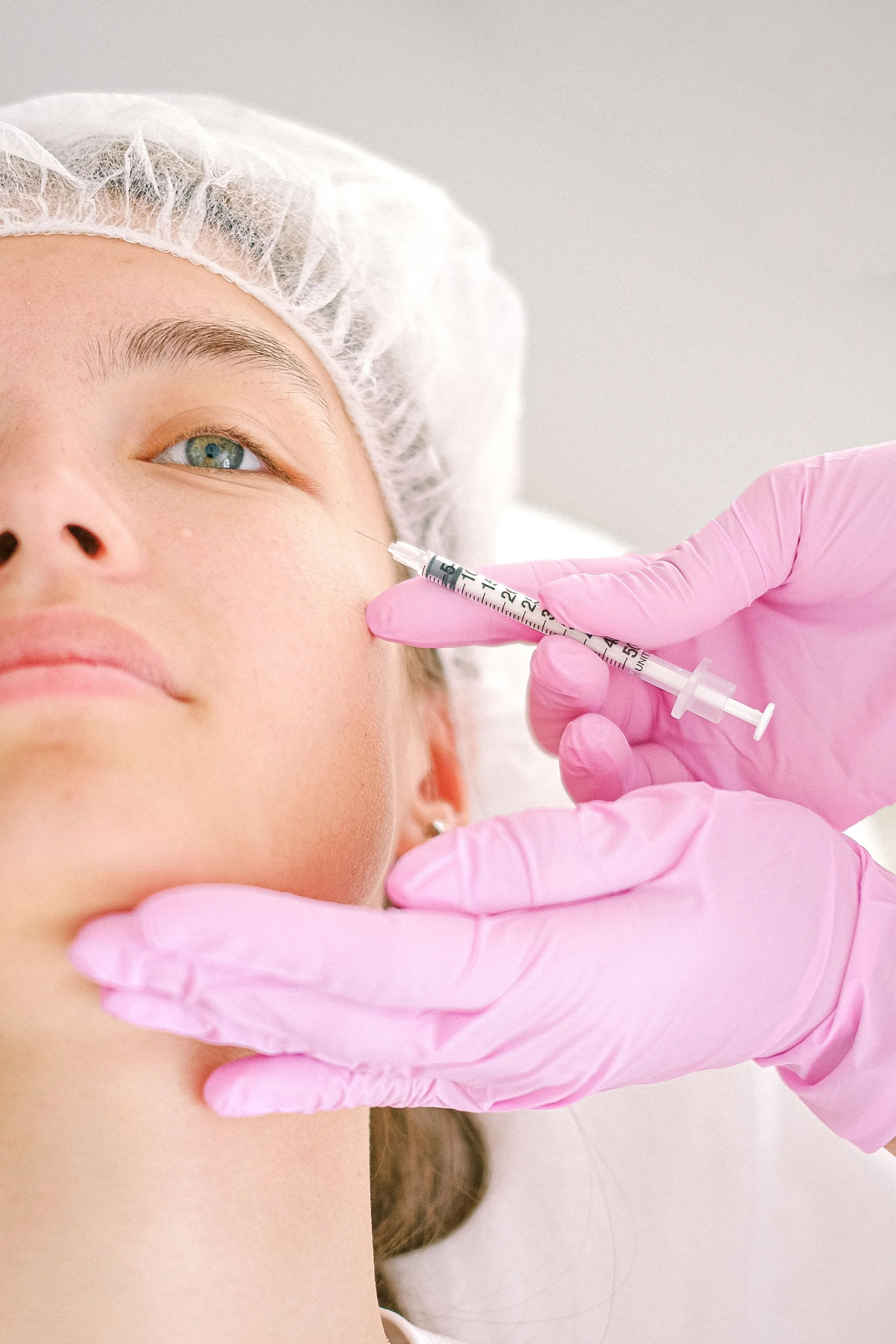 Patient receiving a cosmetic injection