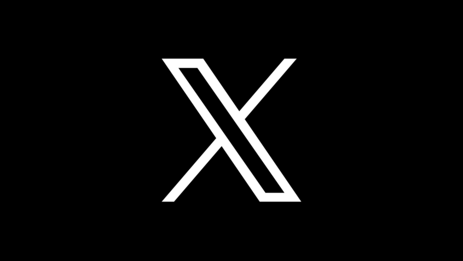 White letter X on a black background.