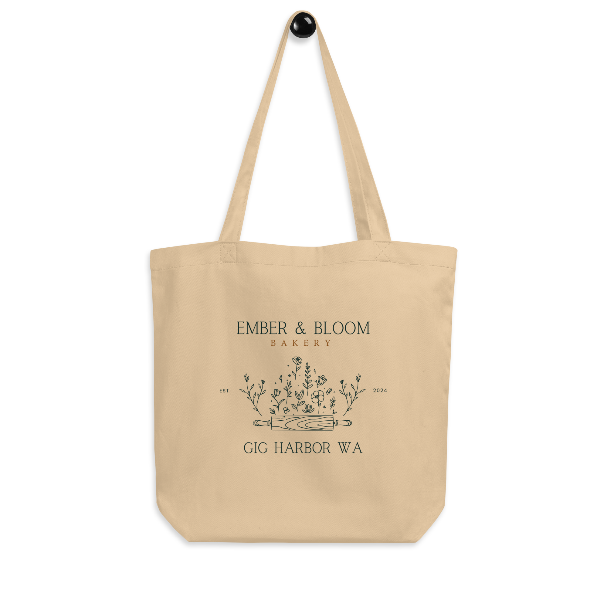 Ember & Bloom brand merchandise featuring custom floral rolling pin logo and Gig Harbor, WA location detail.
