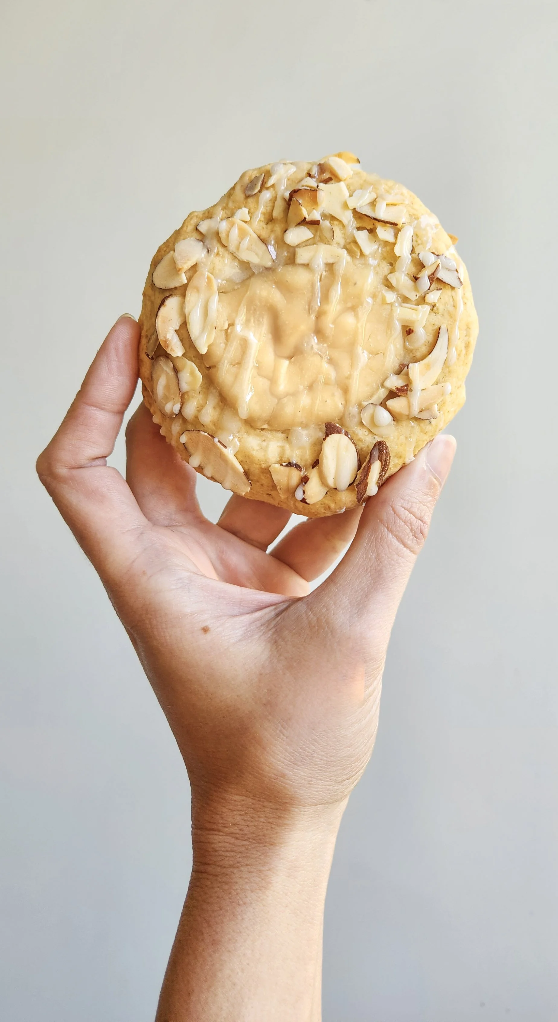 Gluten-free vegan All American Danish pastry with creamy white filling and glaze.