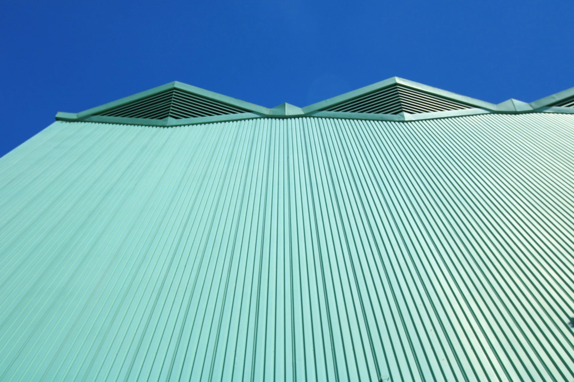 Teal corrugated metal, peaked roofline vents, Fair Park, Dallas, TX