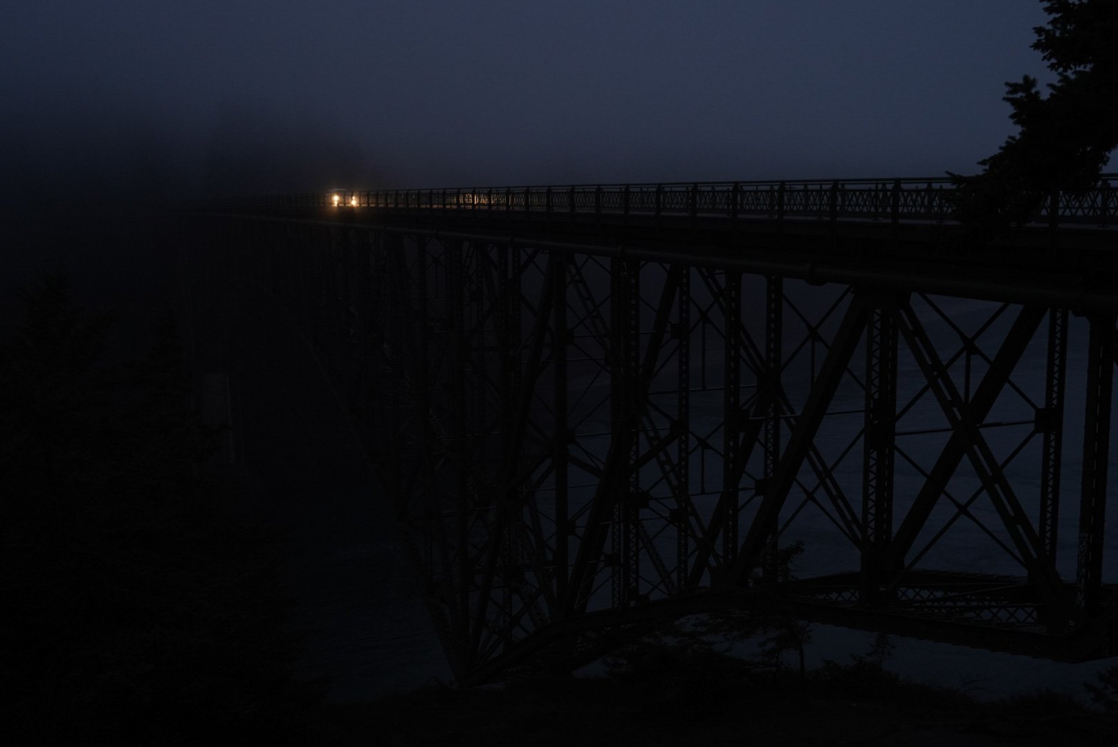 Iron trestle building at night, Washington State