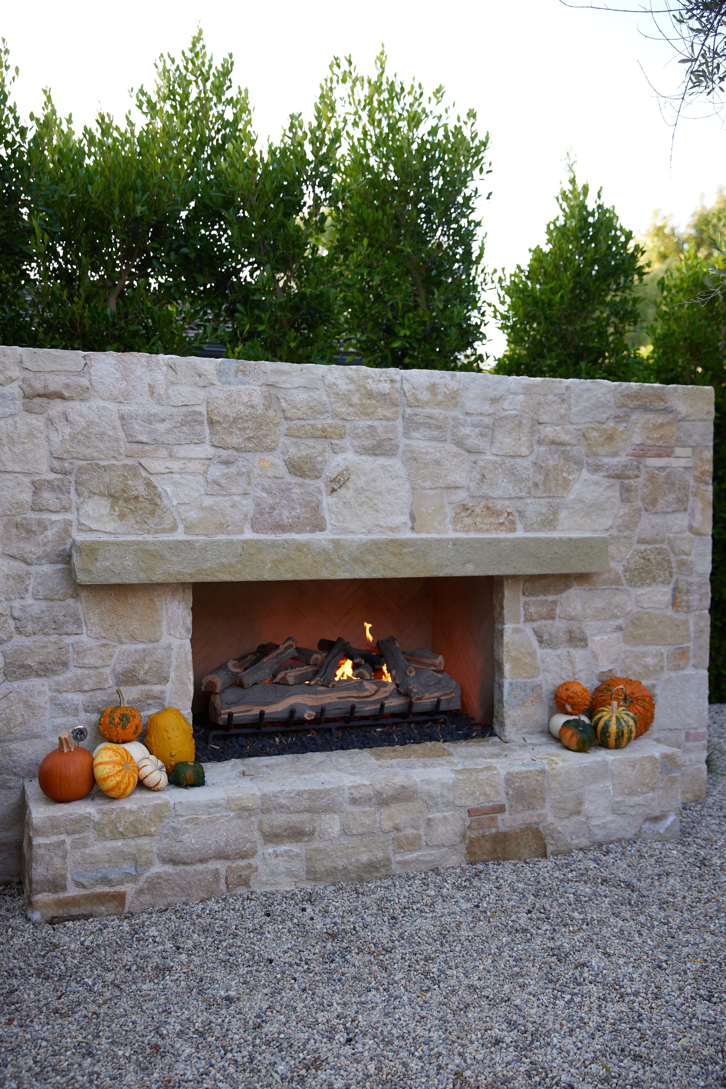 Adding details to your outside fireplace make home feel special and warm during this season.