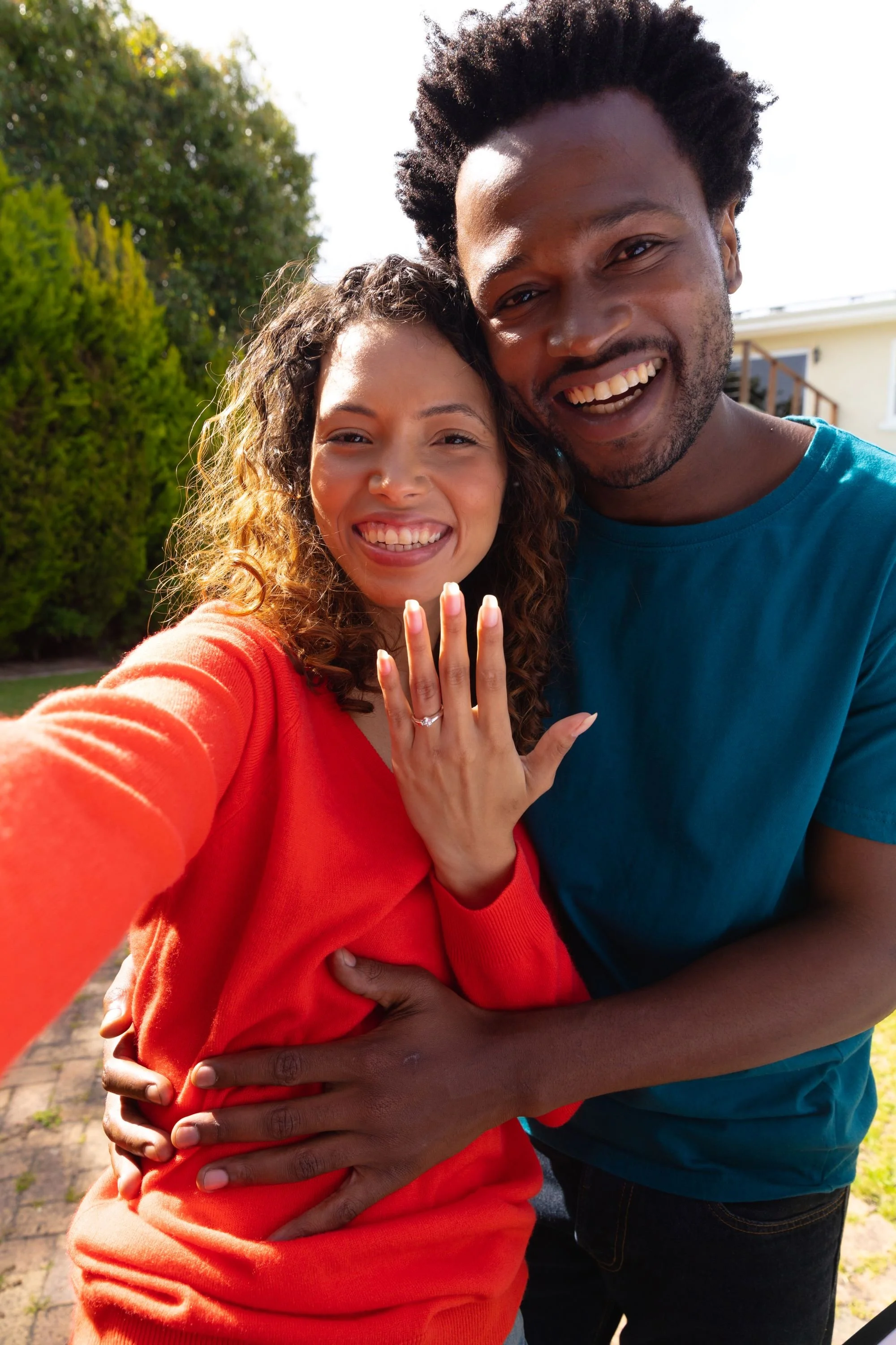 portrait-of-smiling-young-multiracial-couple-showi-2023-11-27-04-53-10-utc.jpg