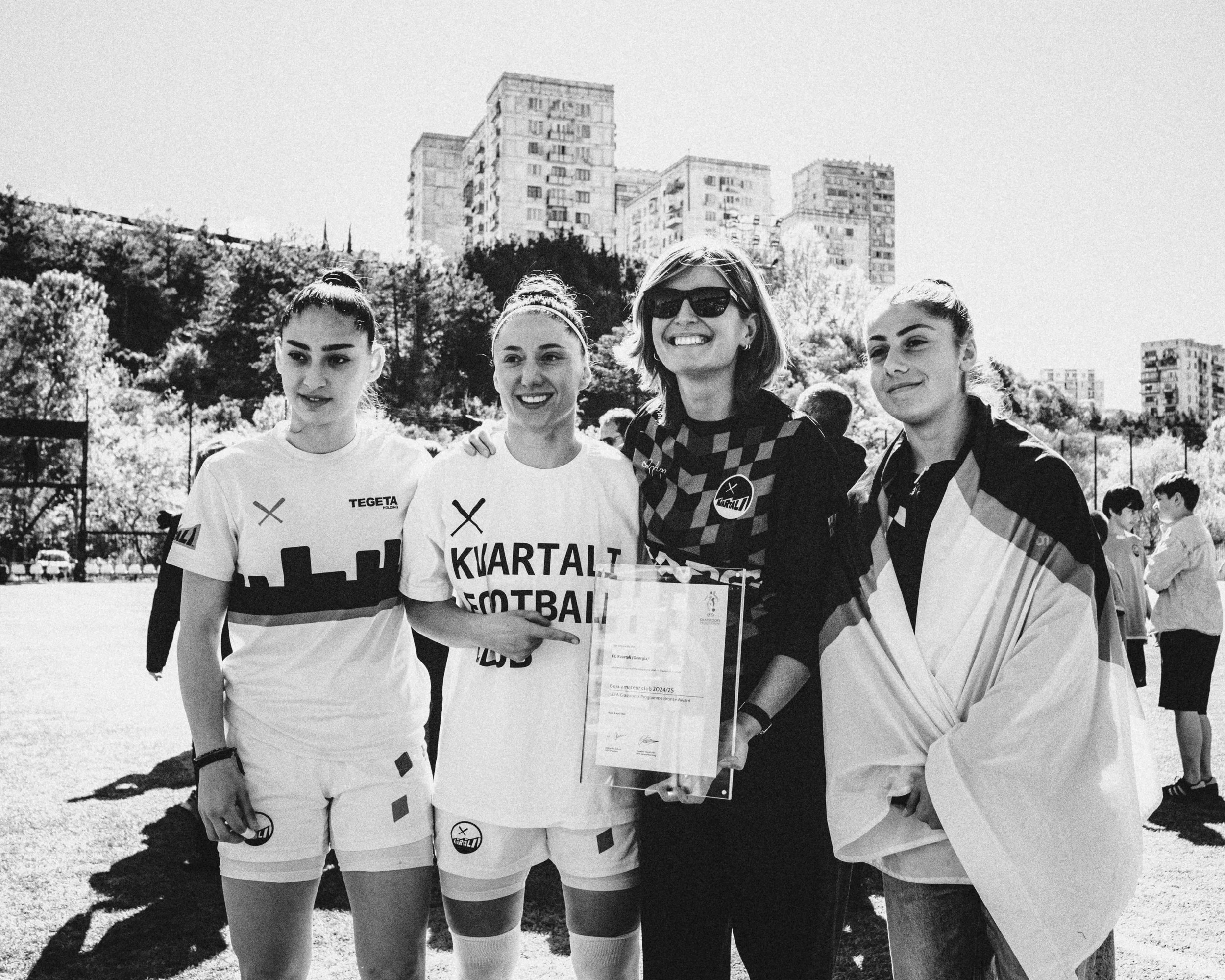 Tiko Ambalia, Nino Pasikashvili, Iako Khomeriki and Lizi Kankia with the UEFA award. The club came third in the Best Amateur Club 24/25 category, narrowly losing to the clubs from Norway and Finland. 

Iako, the Honorary President of Kvartali, is the