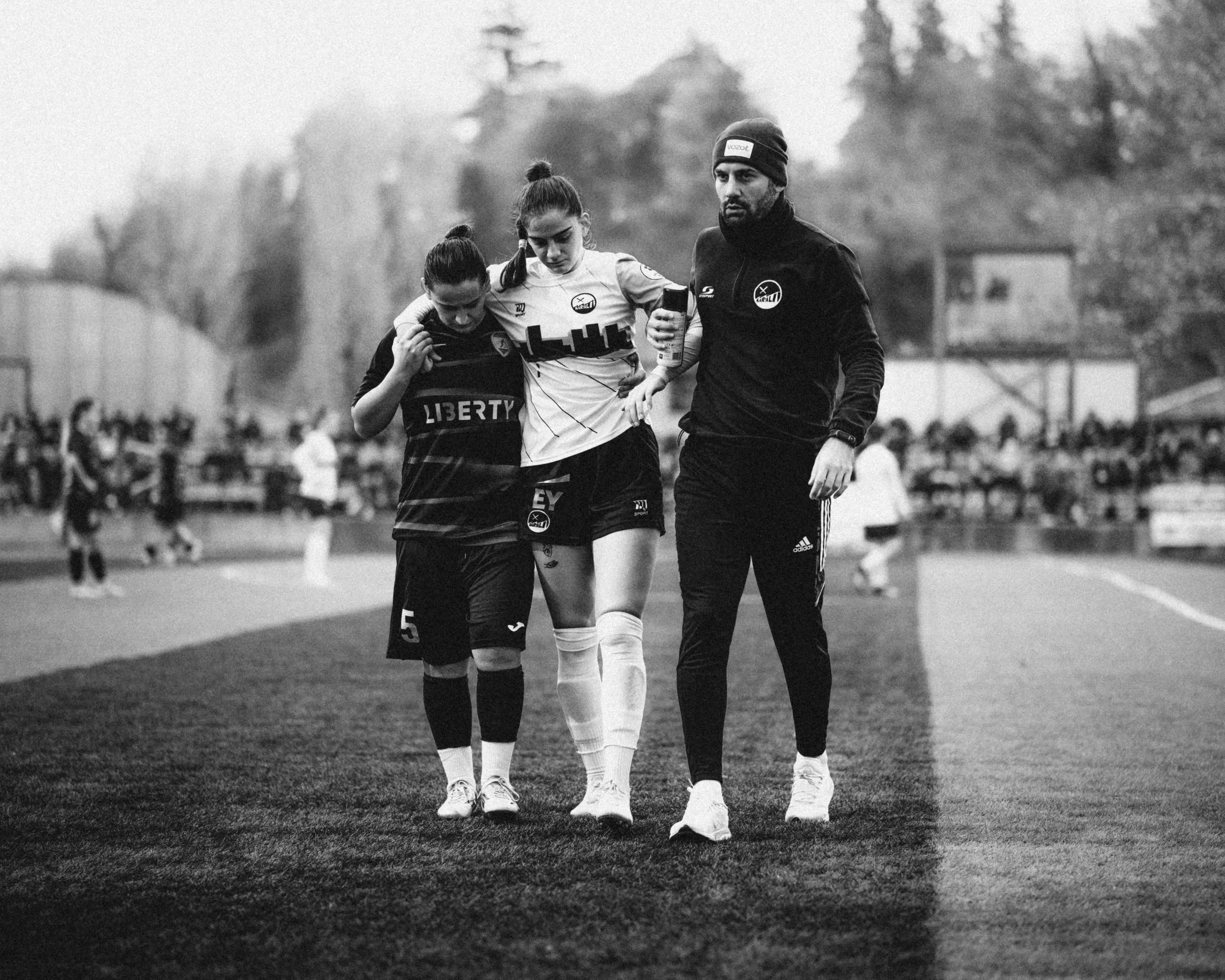 Natela Tsotseria hobbling off pitch after taking a knock.