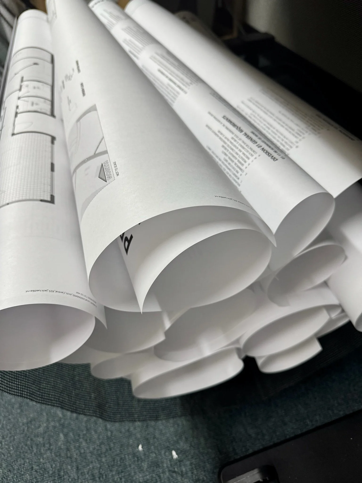 Custom architectural blueprint printing in Houston, TX by Memorial Postal Center for construction plans, drawings, contractors, and design professionals.