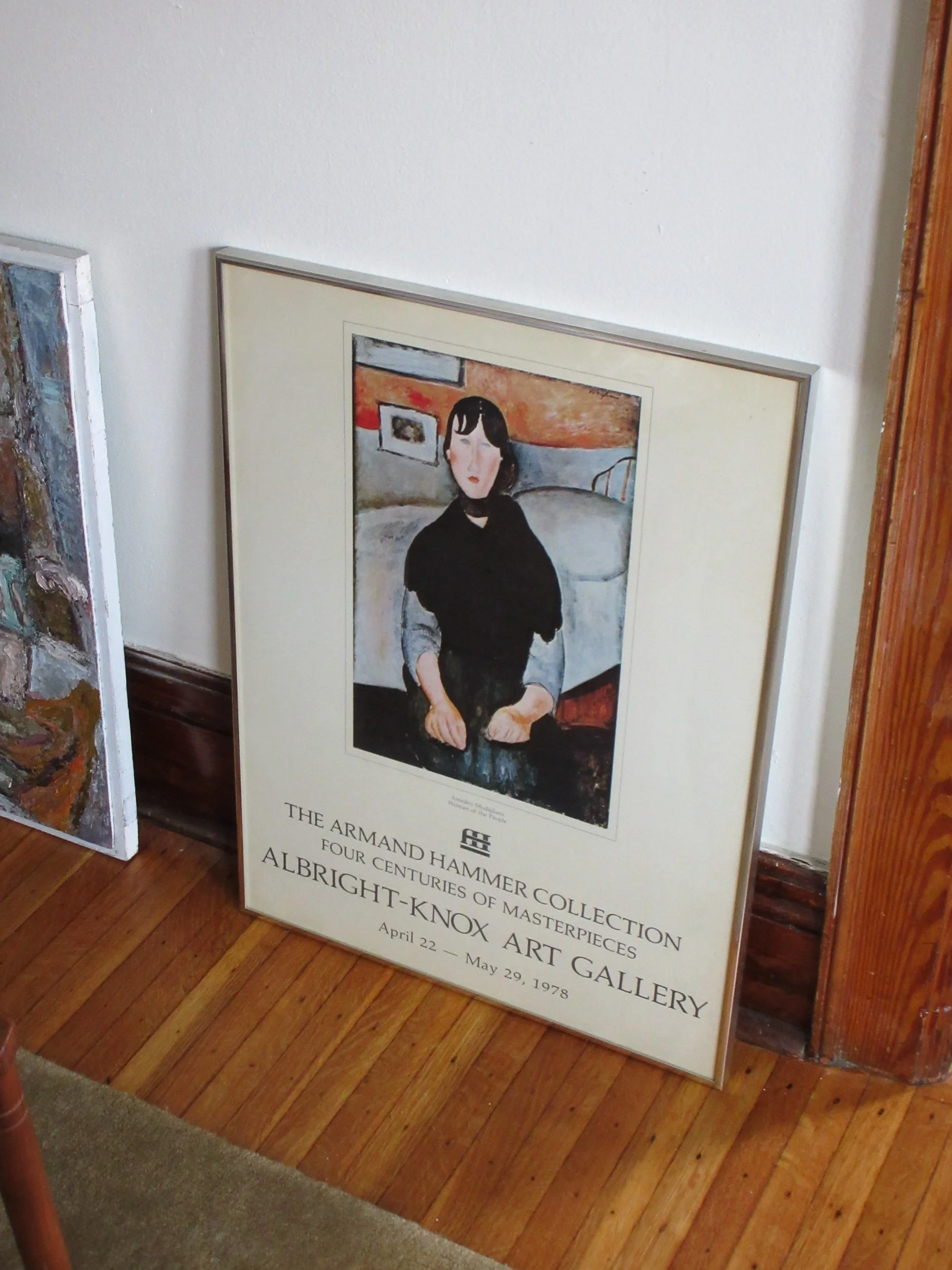 A poster for the Albright-Knox Art Gallery exhibitions, featuring a painting of a woman with dark hair and a black top, sitting in an indoor setting, dated April 22 to May 29, 1978.