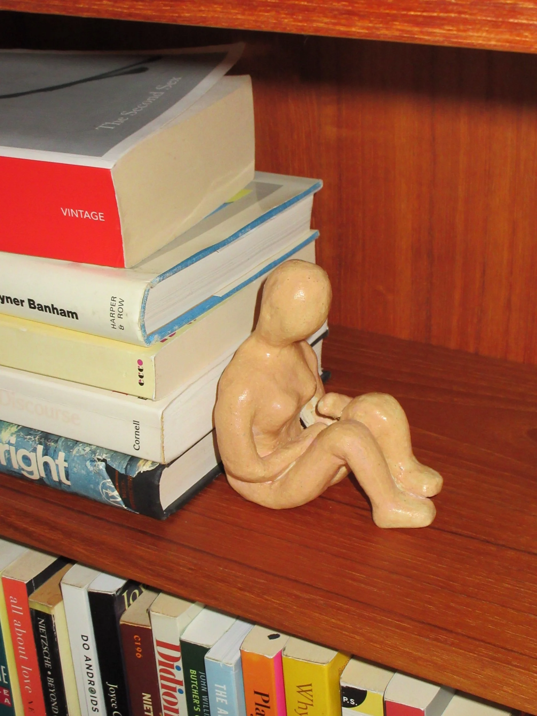 Minimalist Clay Sitting Figure Sculpture