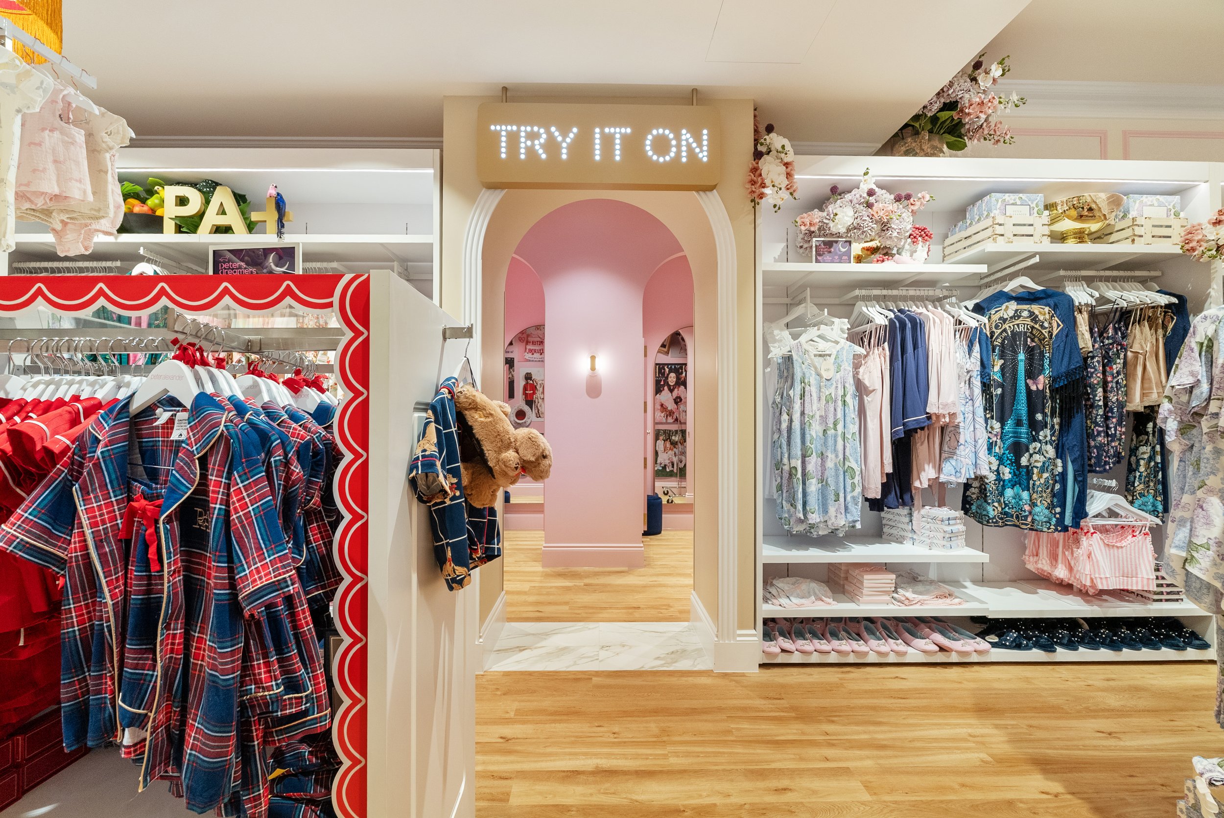 Interior shot capturing customer flow and product zones in the Peter Alexander store design.