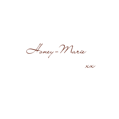 A greeting card with a black background and red cursive text that says "Happy Birthday Honey-Marie xx."