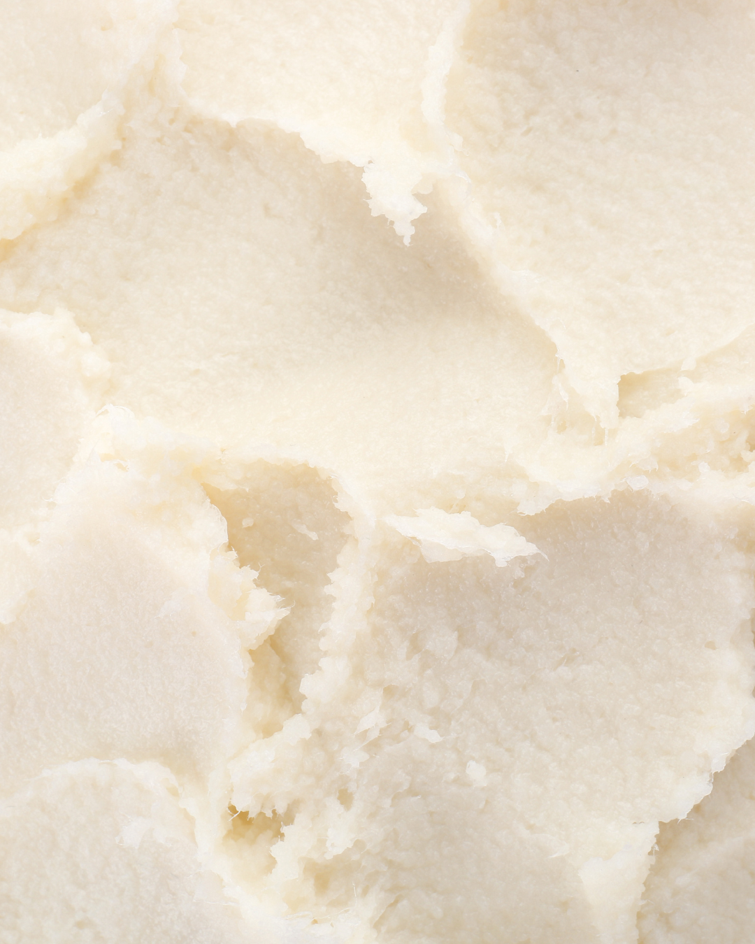 Close-up of a scoop of vanilla ice cream.