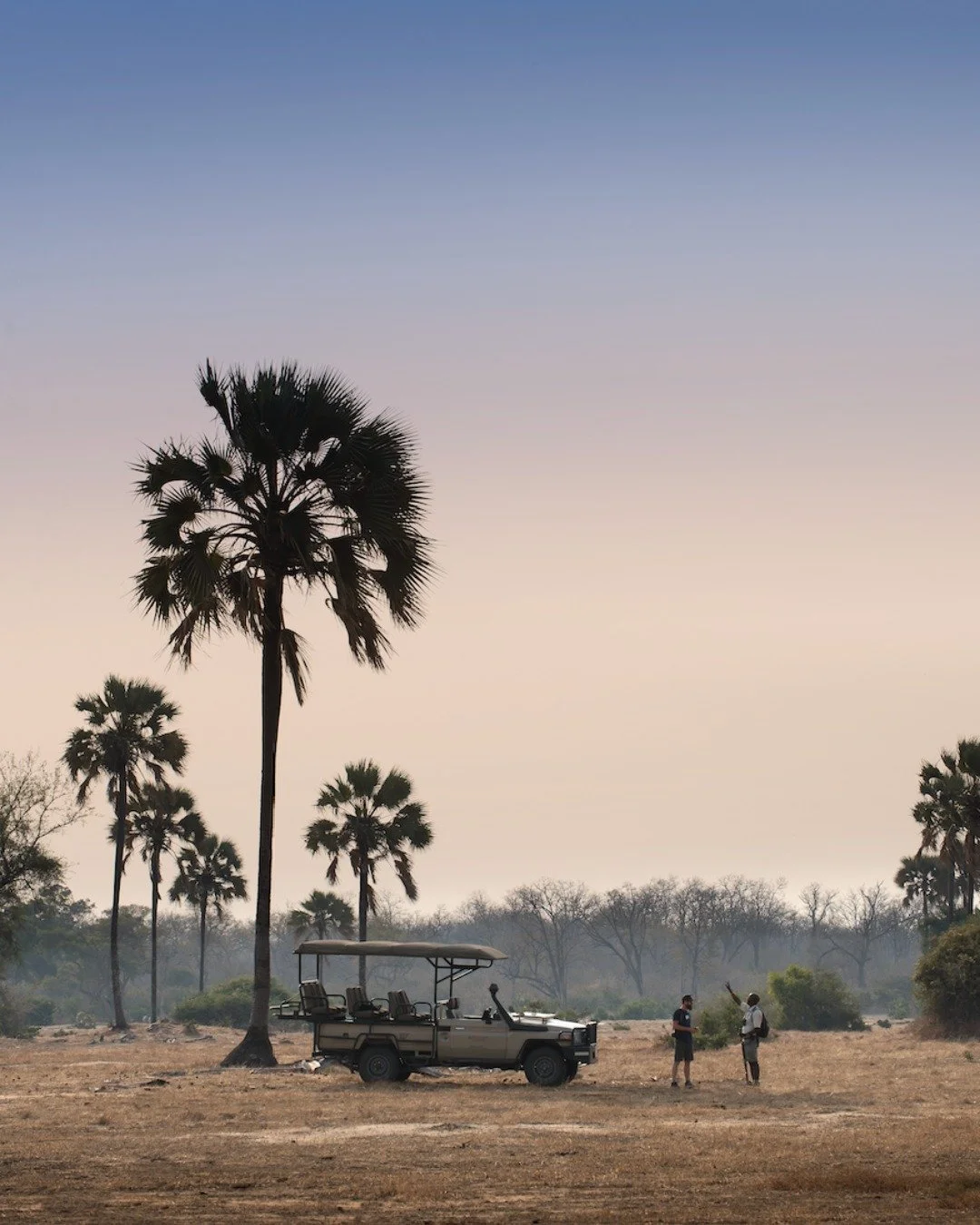 Kanga Expeditions, Mana Pools.

Set around a remote pan with no other water for miles, this is where the wild comes to you. Elephants, wild dogs, and endless birdlife gather just metres away, day and night.
Canvas tents, walking safaris, and a front-