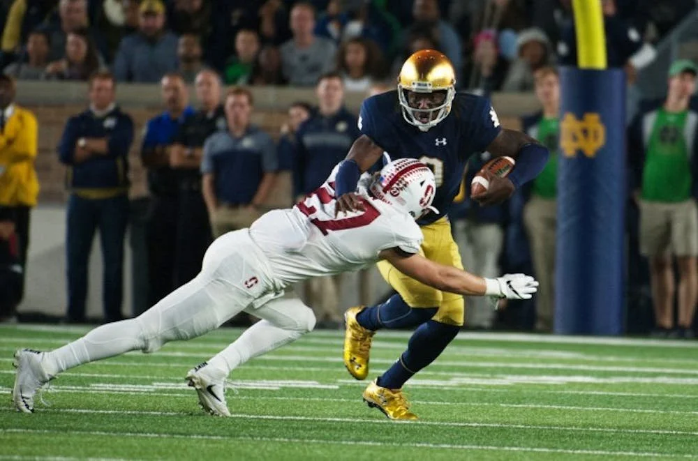#12 Notre Dame Dominates Stanford 49-7, Earns Legends Trophy