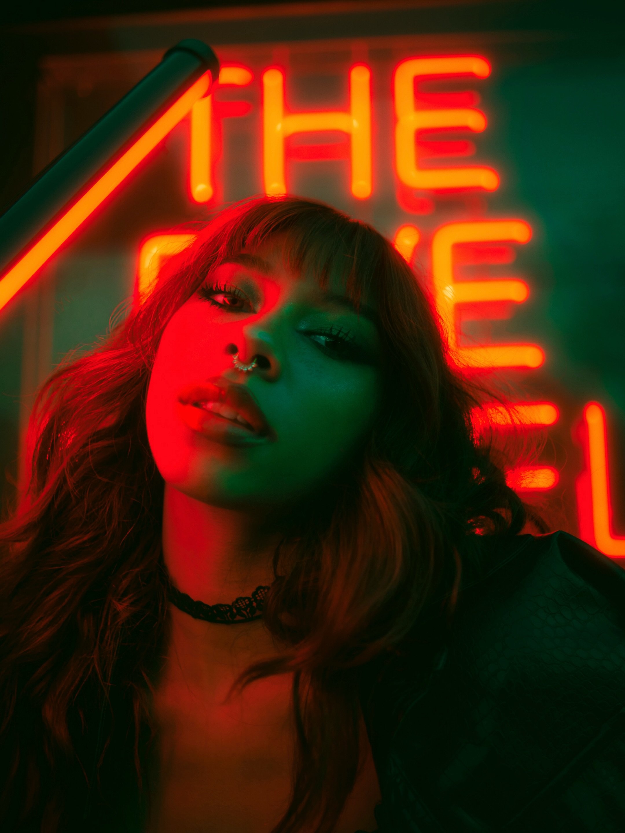 Color Grading really did some magic here to bring out a more haunting edit.

Fun Fact: I brought a RGB light that we used in front of @bellaphanthavongsa to help illuminate her face and bring some of that neon glow from the foreground to the front.

