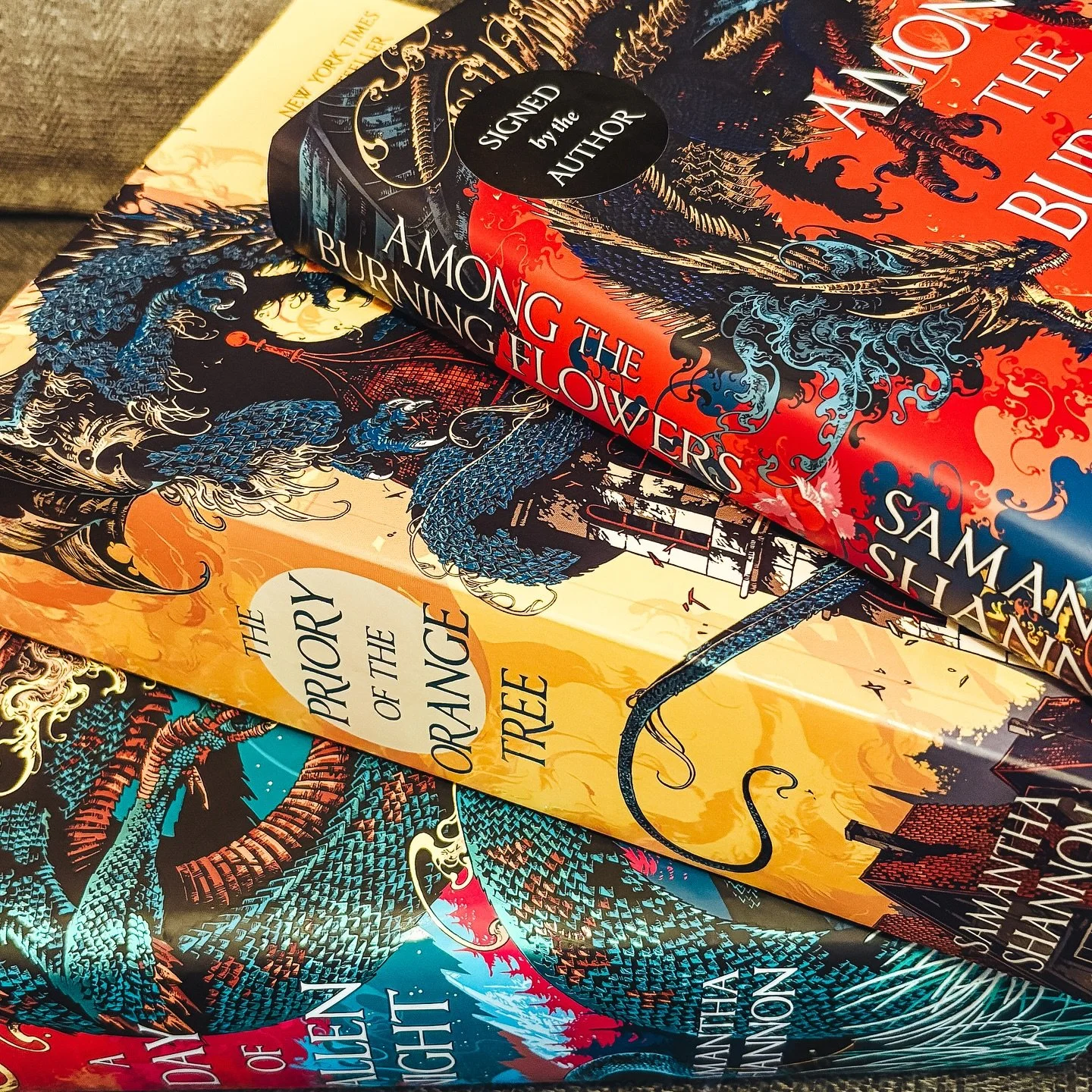 the best books are gifts from friends 💝 &bull; if you&rsquo;re seeing this post, this is a sign for you to start reading The Roots of Chaos series by @say_shannon and/or visit @aseatatthetablebooks because we love an inclusive &amp; accessible space