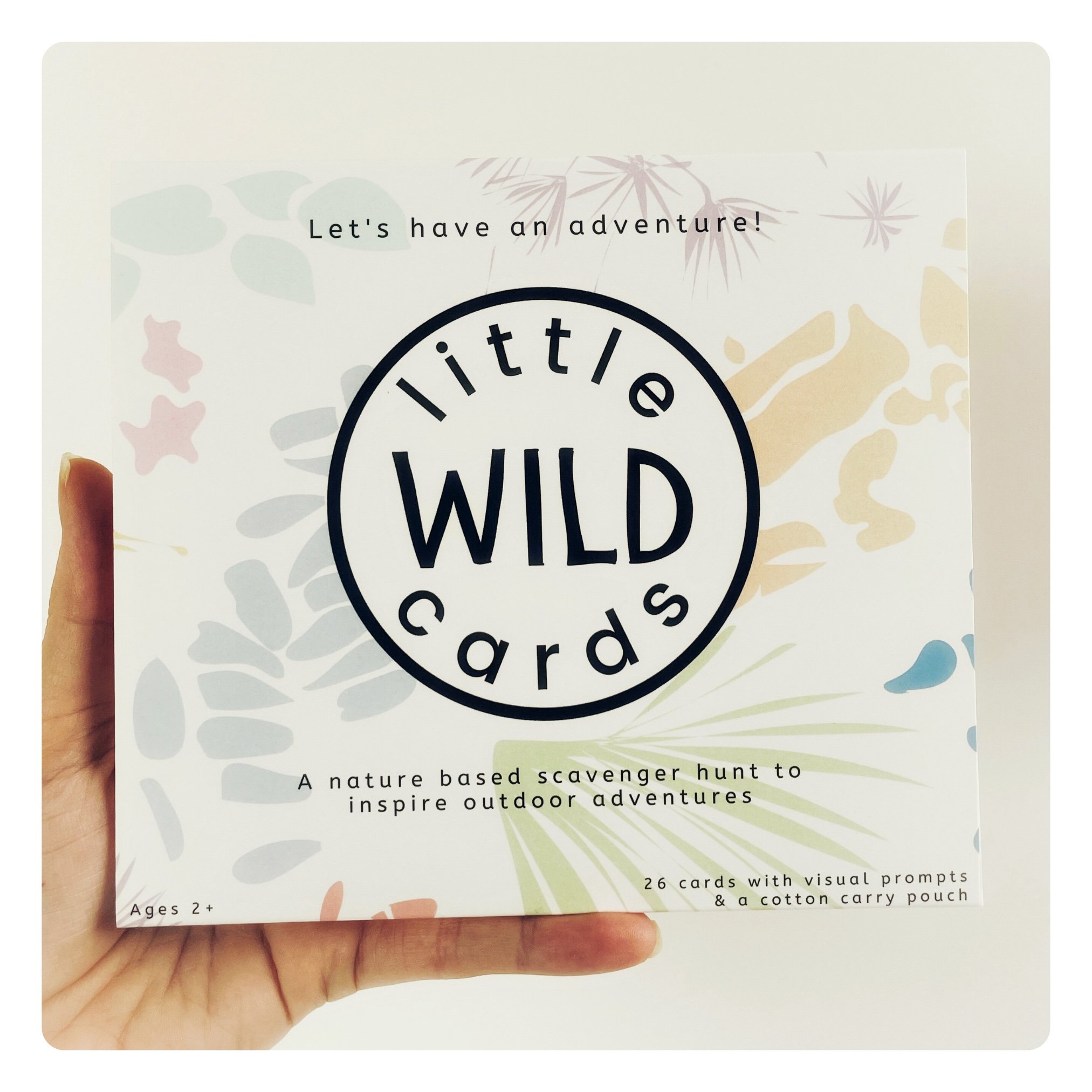 Close-up view of the Little Wild Cards packaging with high-quality cards and photographic visuals.