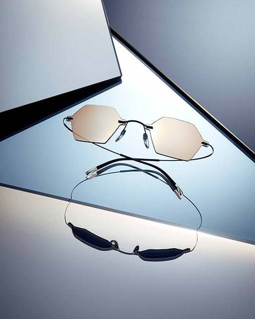 Stilllife einer Sonnenbrille auf glänzender Oberfläche, Visual für Silhouette Special Edition TMA 2019, umgesetzt von imagespy.