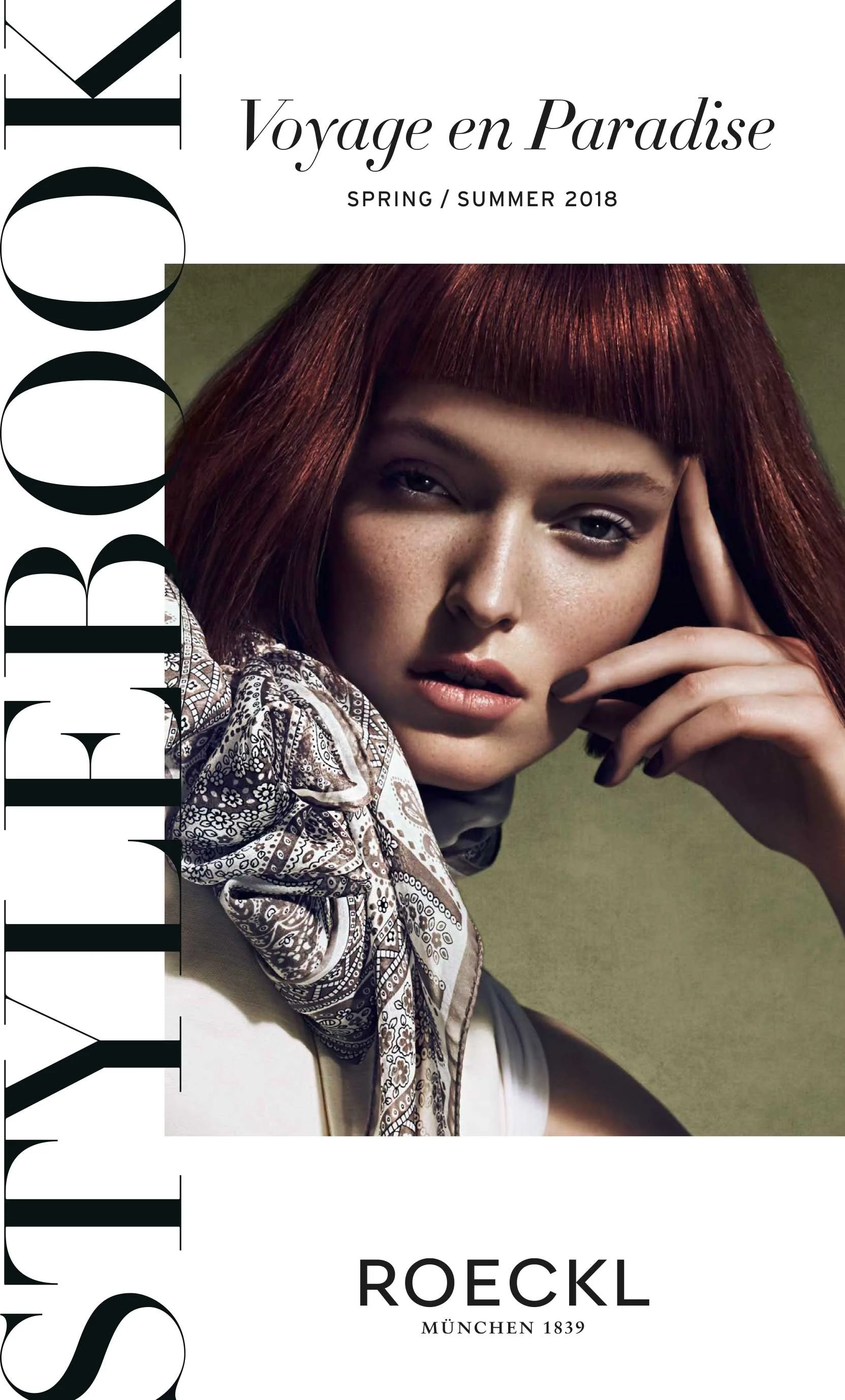 Cover Roeckl Stylebook Spring/Summer 2018 „Voyage en Paradise“ mit Frau mit roten Haaren und Tuch, umgesetzt von imagespy.