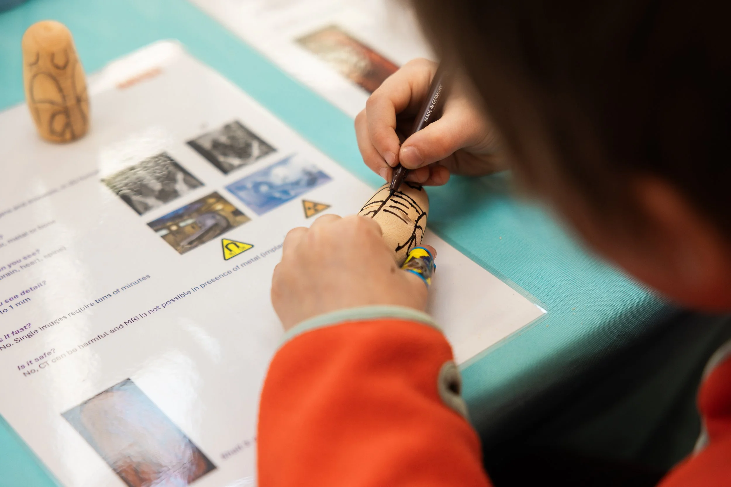 Child engaging with multimodal imaging activity