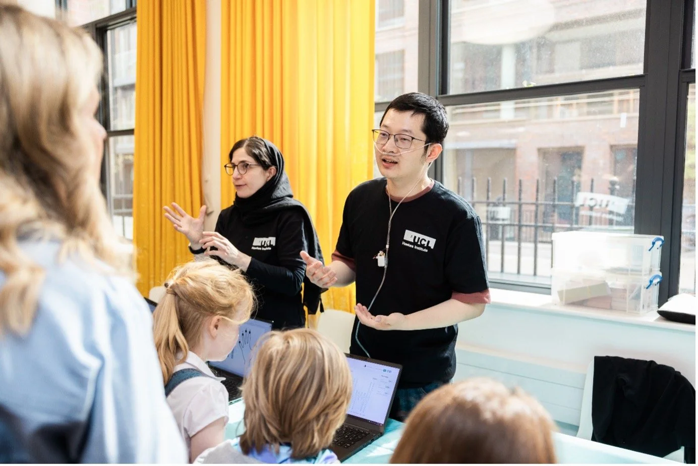 Researcher showcasing breathing sensor