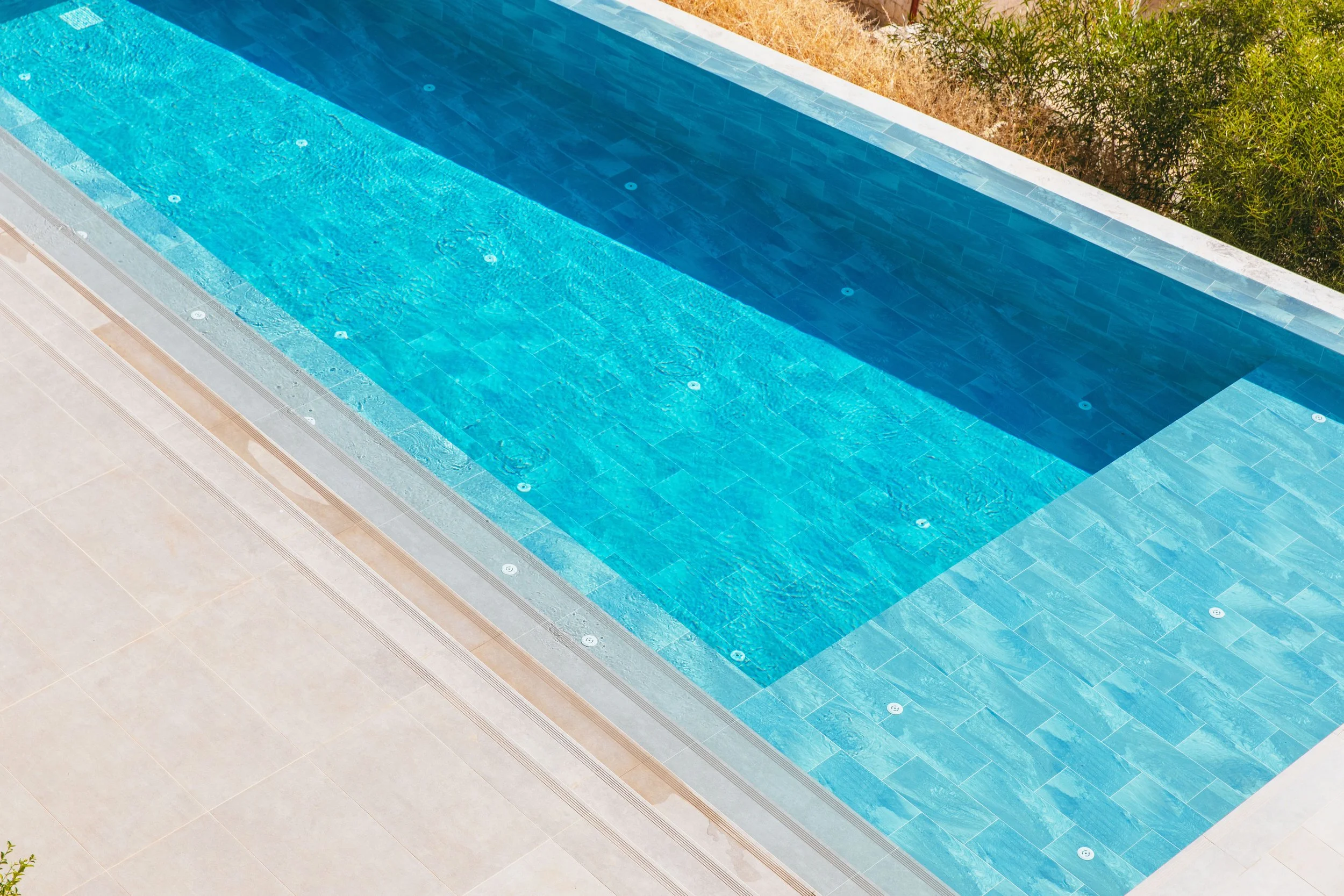 How to Maintain a Concrete or Tiled Swimming Pool: The Engineering Guide