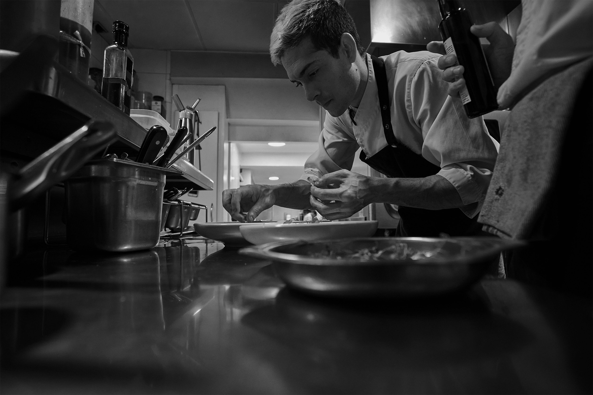 Foodservice consultancy expert working in a commercial kitchen environment