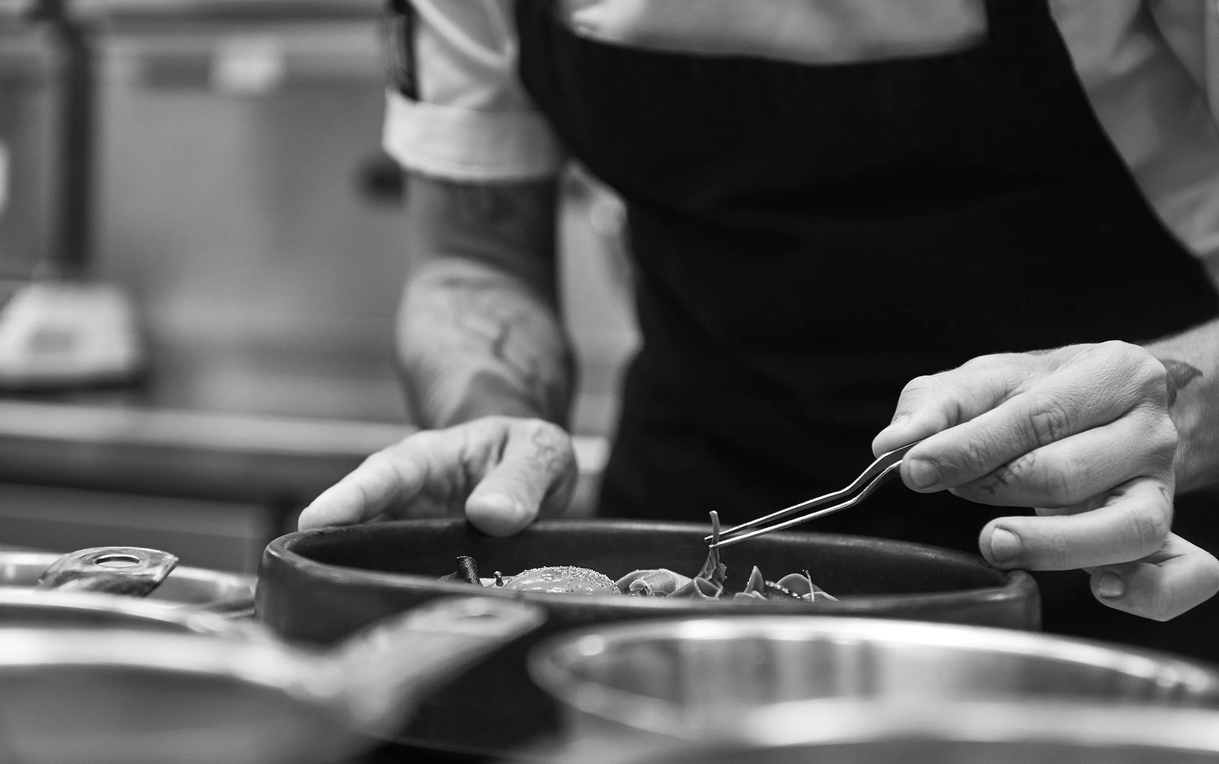 Professional chef demonstrating expertise within catering consultancy services