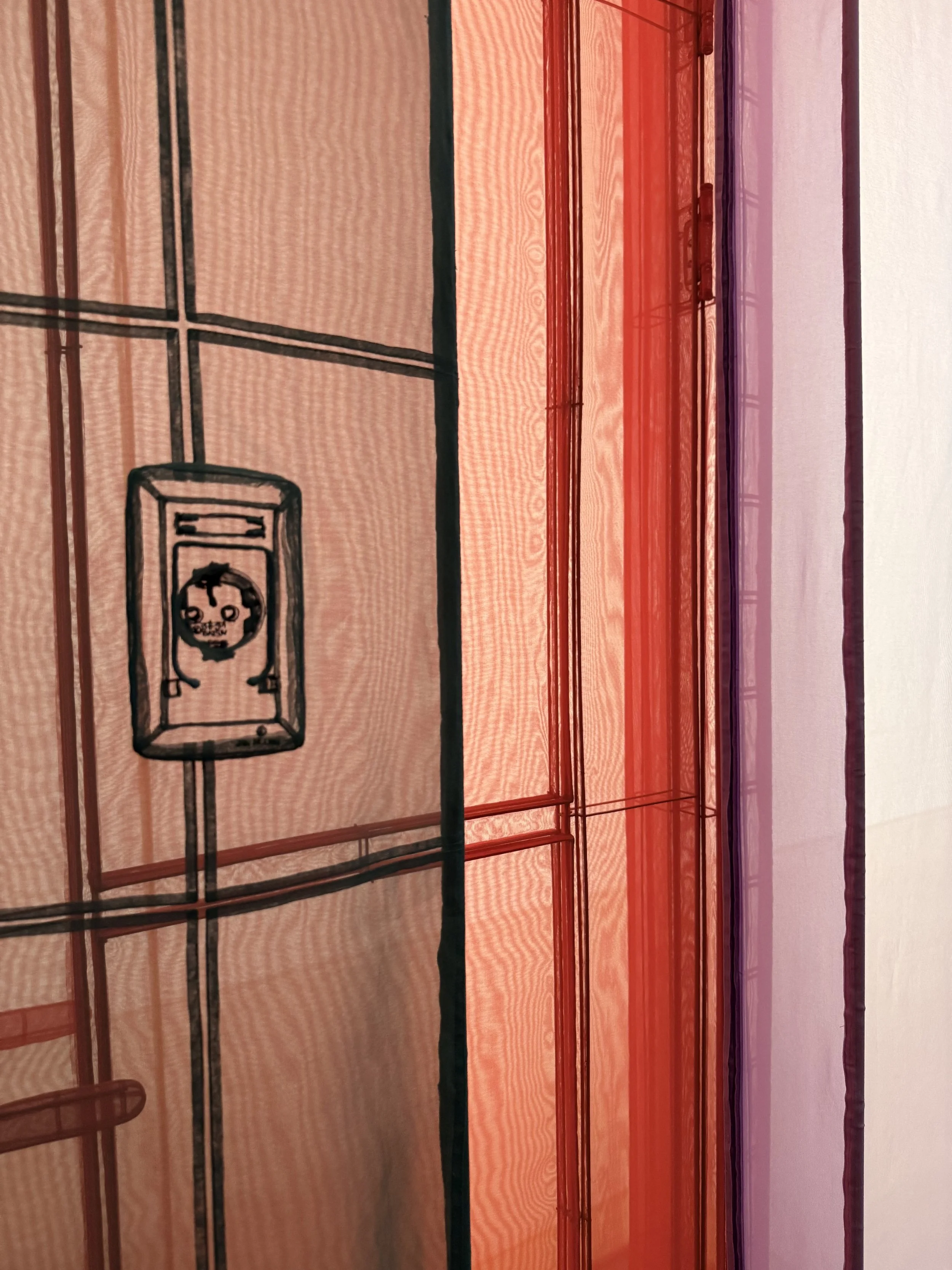 Detail of Do Ho Suh’s translucent peach-colored fabric wall with a reconstructed household fixture at MMCA Seoul.