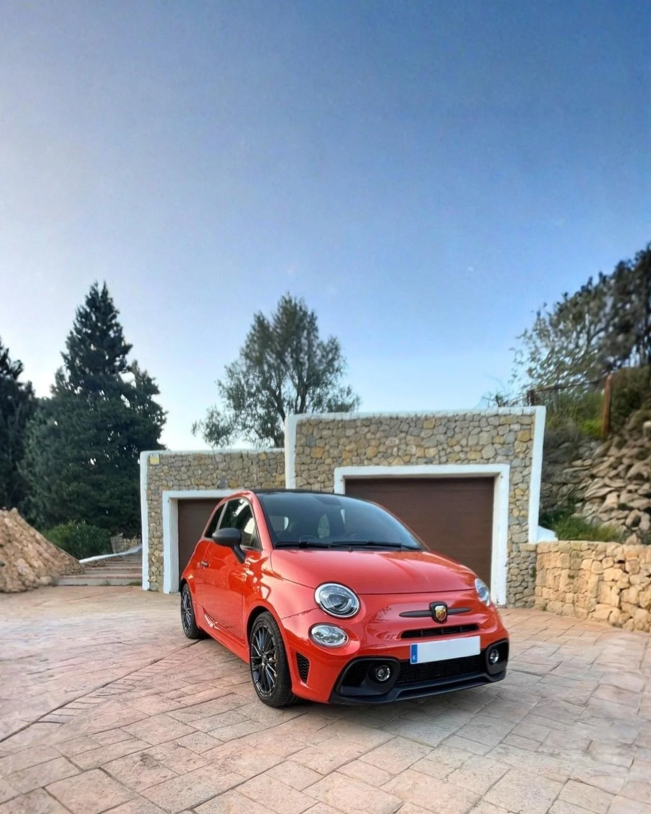 🇬🇧 SOLD &ndash; Abarth 695C Cabrio. Another successful consignment sale from our private finca on Ibiza. Finished in Racing Orange with black convertible roof, this virtually new Abarth had covered only 2.800 km and delivered exactly the kind of fu