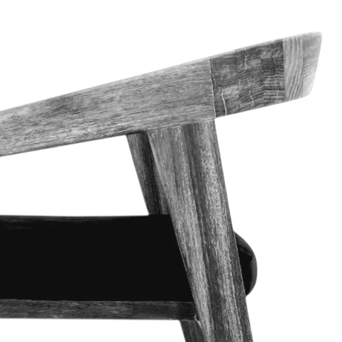 Close-up of a wooden chair with a black seat against a white background.