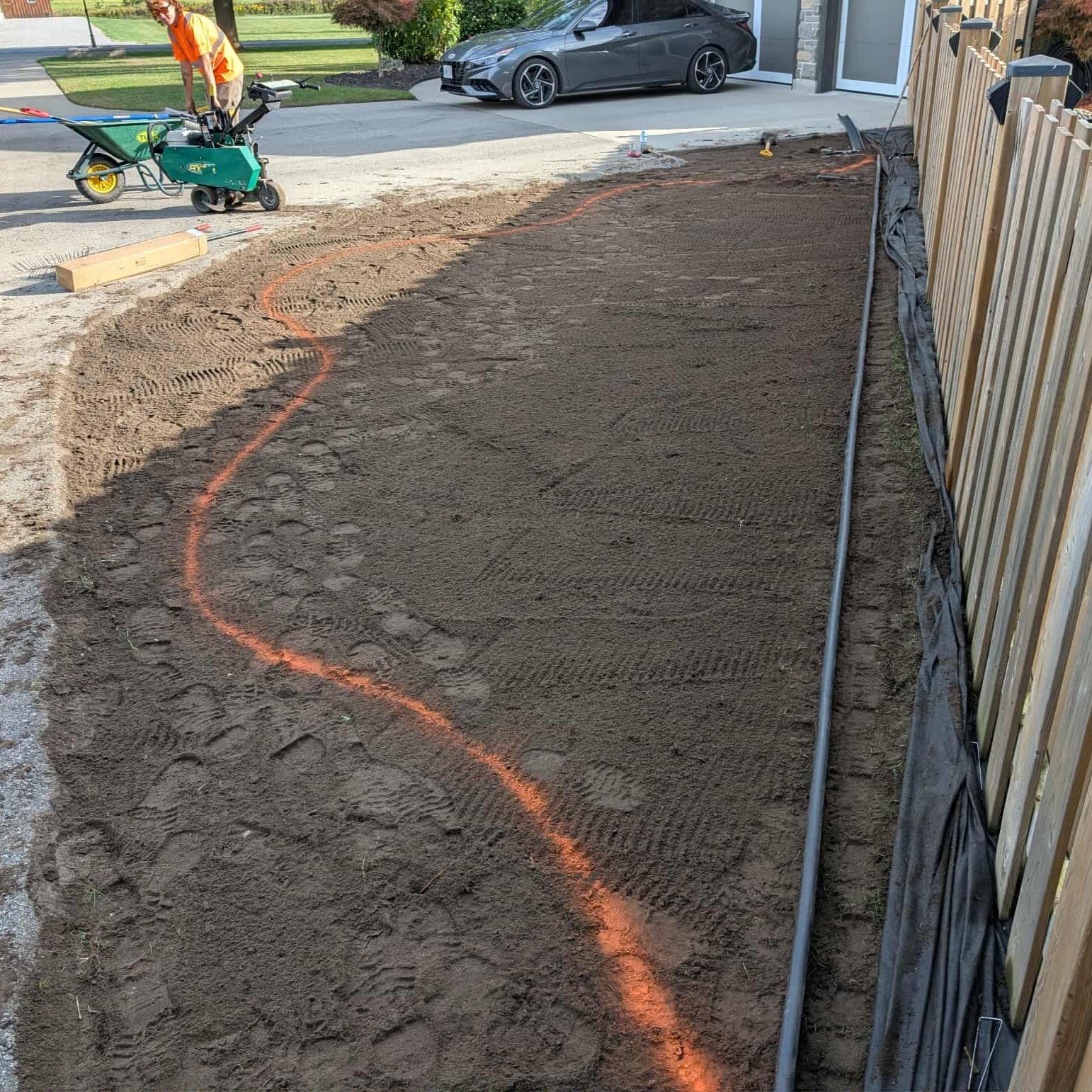 From start to finish on this one 👌
(Shot earlier this year when we actually had the good weather on our side.)

We prepped the base, set clean edges, laid out the river rock border, and finished it off with a fresh, rich layer of mulch. The contrast