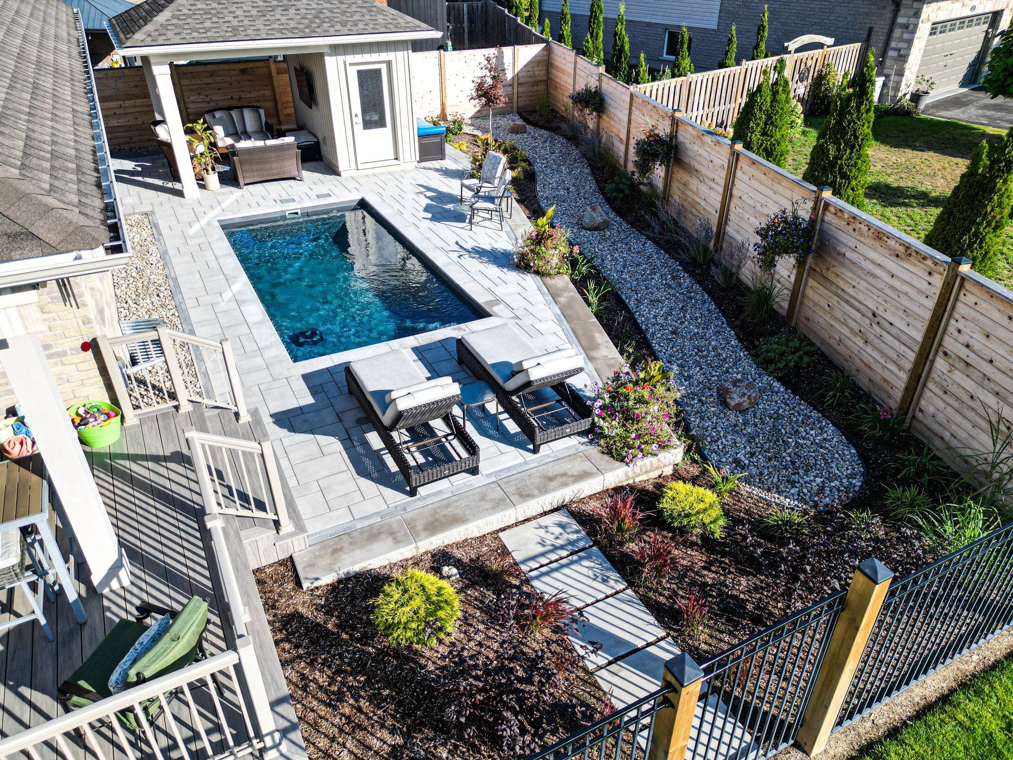 This was the first pool that we installed this season and it turned out awesome. It&rsquo;s a perfect example of what you can do with a relatively small space. Tight yards don&rsquo;t mean you have to compromise &mdash; with the right pool placement,