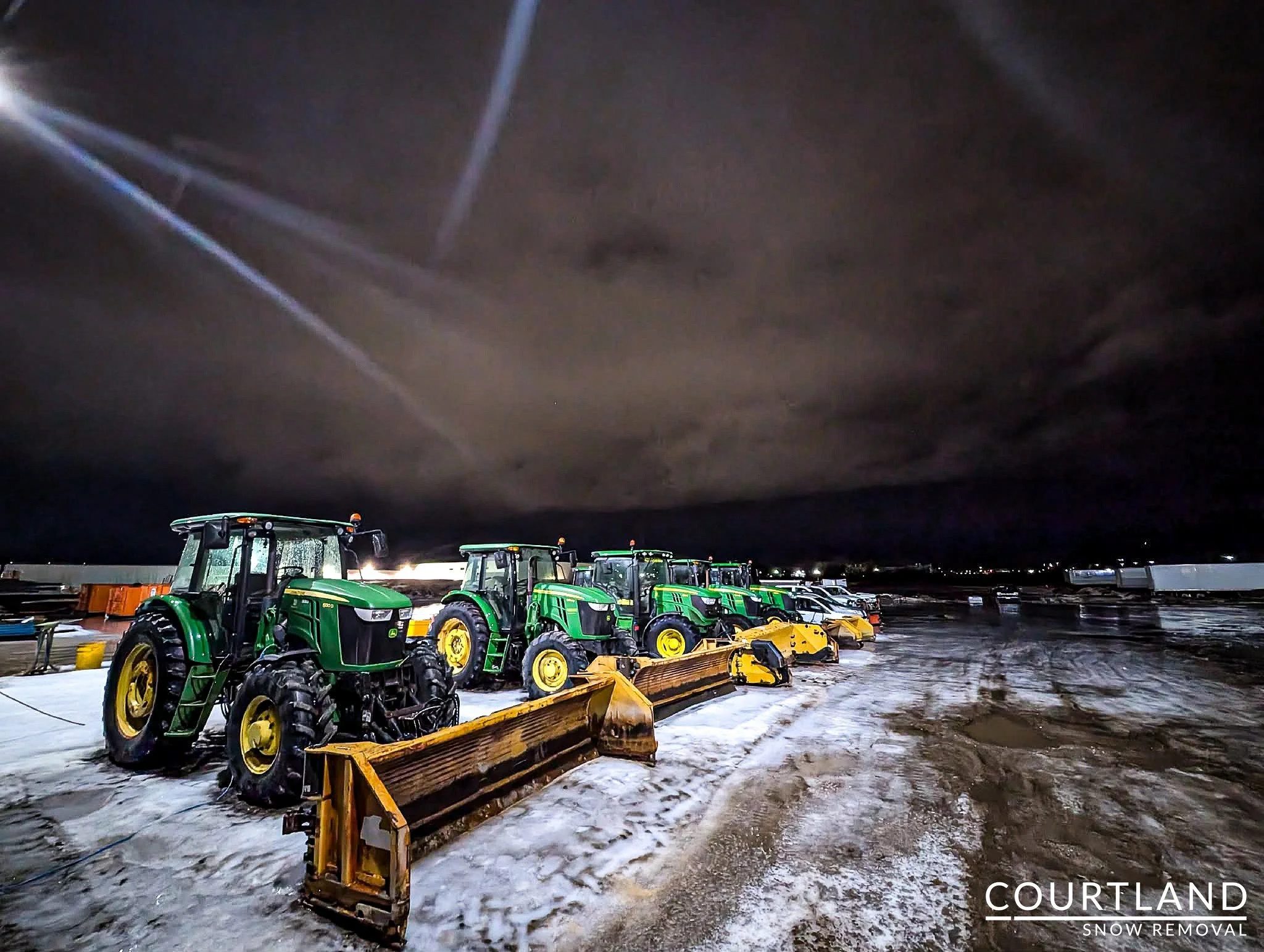 That moment before the storm hits&hellip; 🌩️❄️

Our machines are staged, fueled, and ready&mdash;because winter doesn&rsquo;t wait, and neither do we.

#NightShift #SnowRemoval #WinterService #FleetReady
