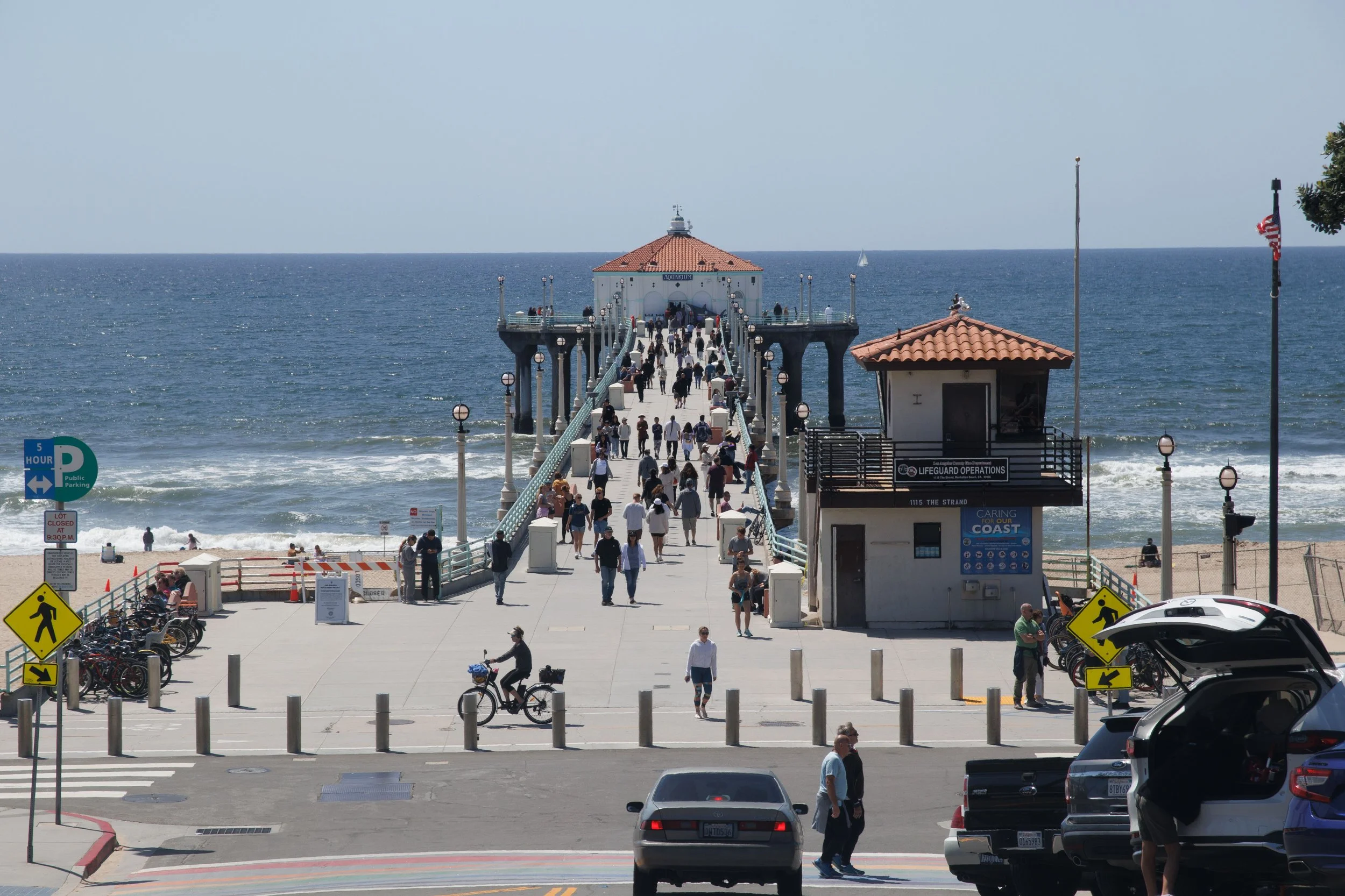 people walking on manhattan beach pier california south bay los angeles ocean views