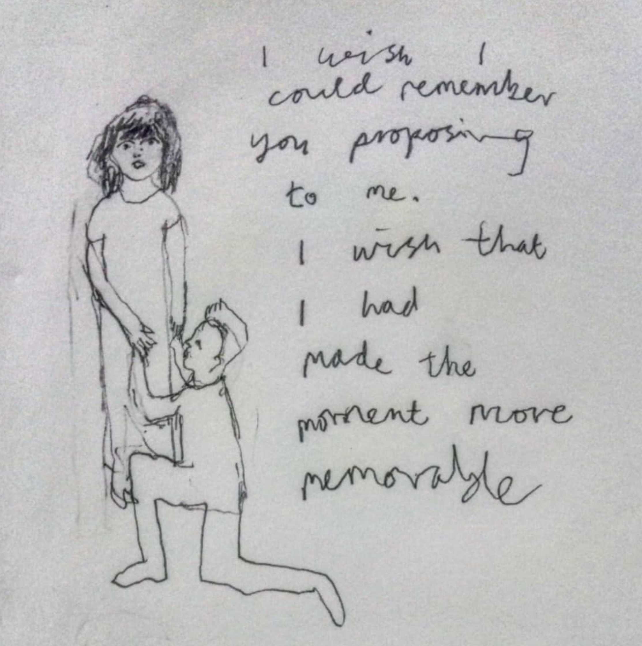 A hand-drawn sketch of a woman with medium-length hair and a child kneeling on one knee, holding her hand. To the right, there is handwritten text that reads: 'I wish I could remember you proposing to me. I wish that I had made the moment more memorable.'