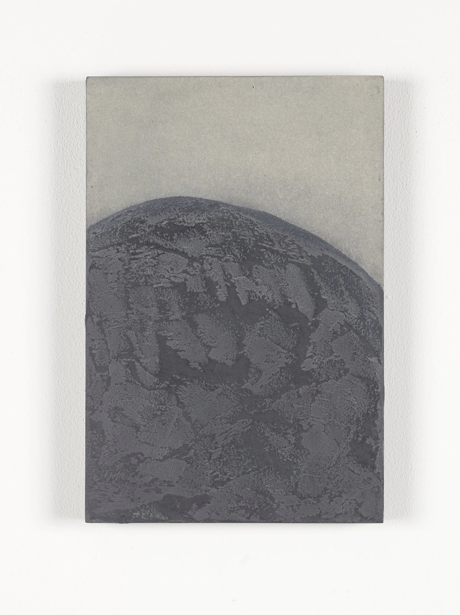 Black and white abstract art piece with a textured mountainous pattern.