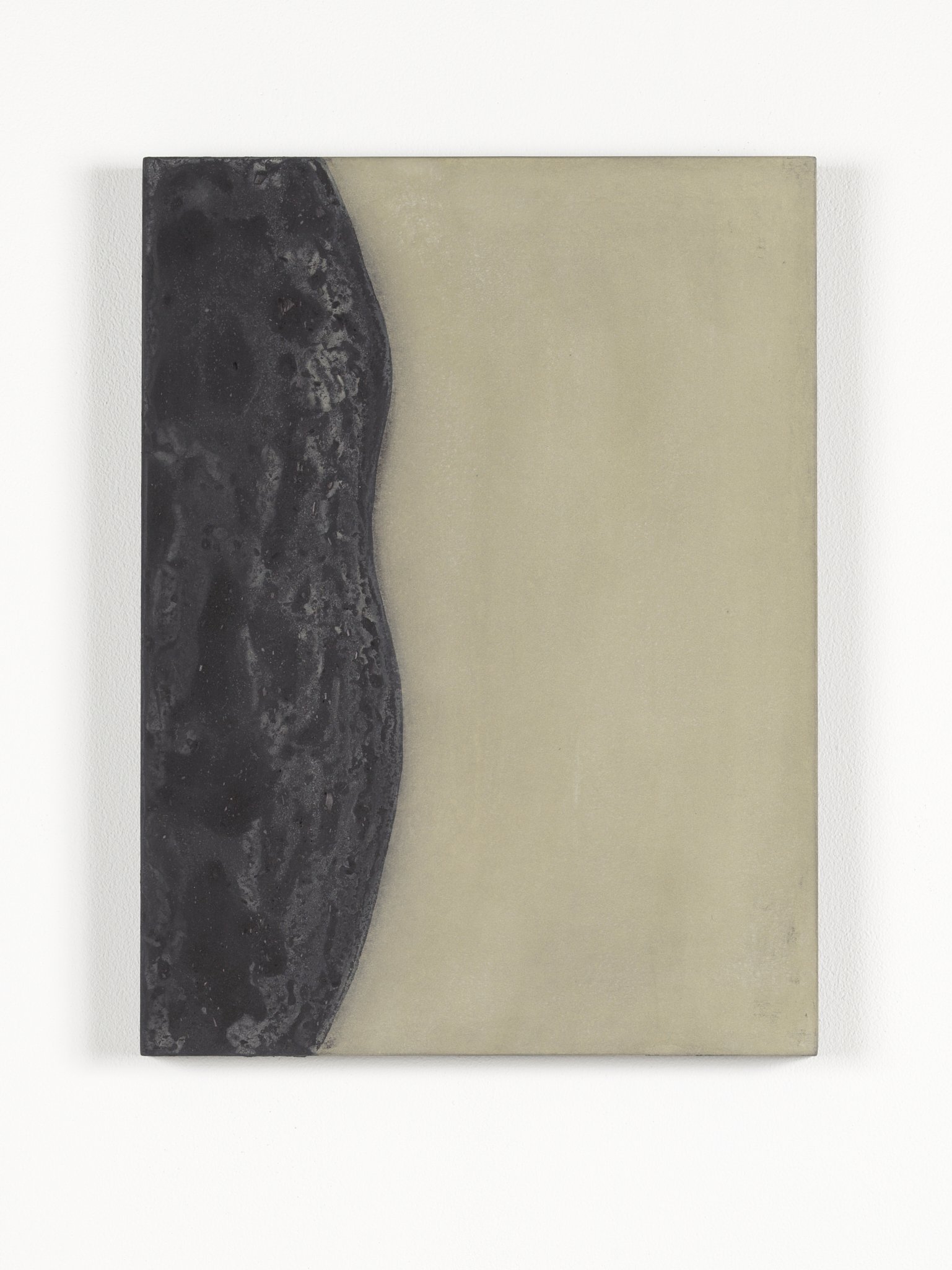 Close-up of a rectangular artwork with a black textured curved shape on the left and a plain beige background on the right, mounted on a white wall.