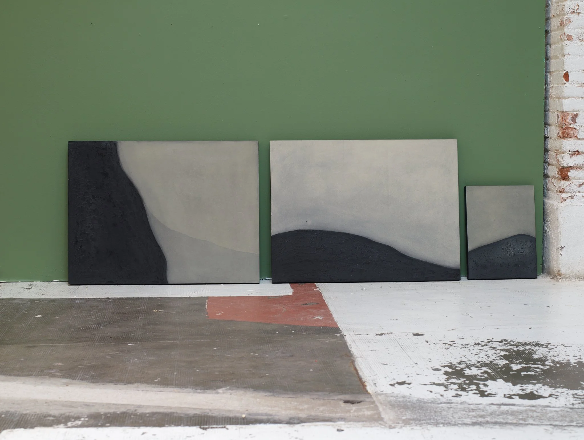 Three abstract works from the Extension series by Ekaterina Galera, displayed against a green wall.