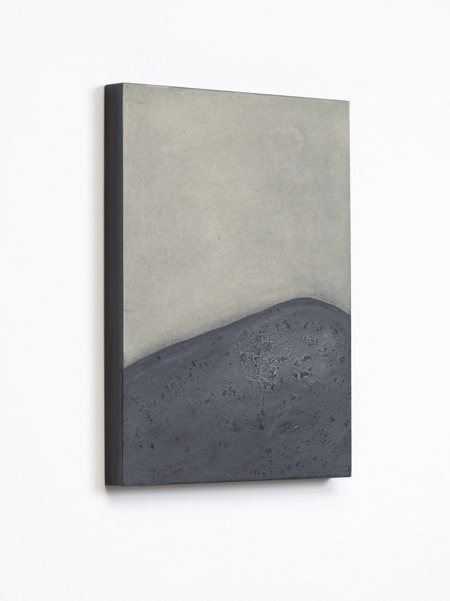 Minimalist abstract painting by Ekaterina Galera, combining charcoal and mineral textures with a neutral palette, organic forms and a strong focus on material and space.