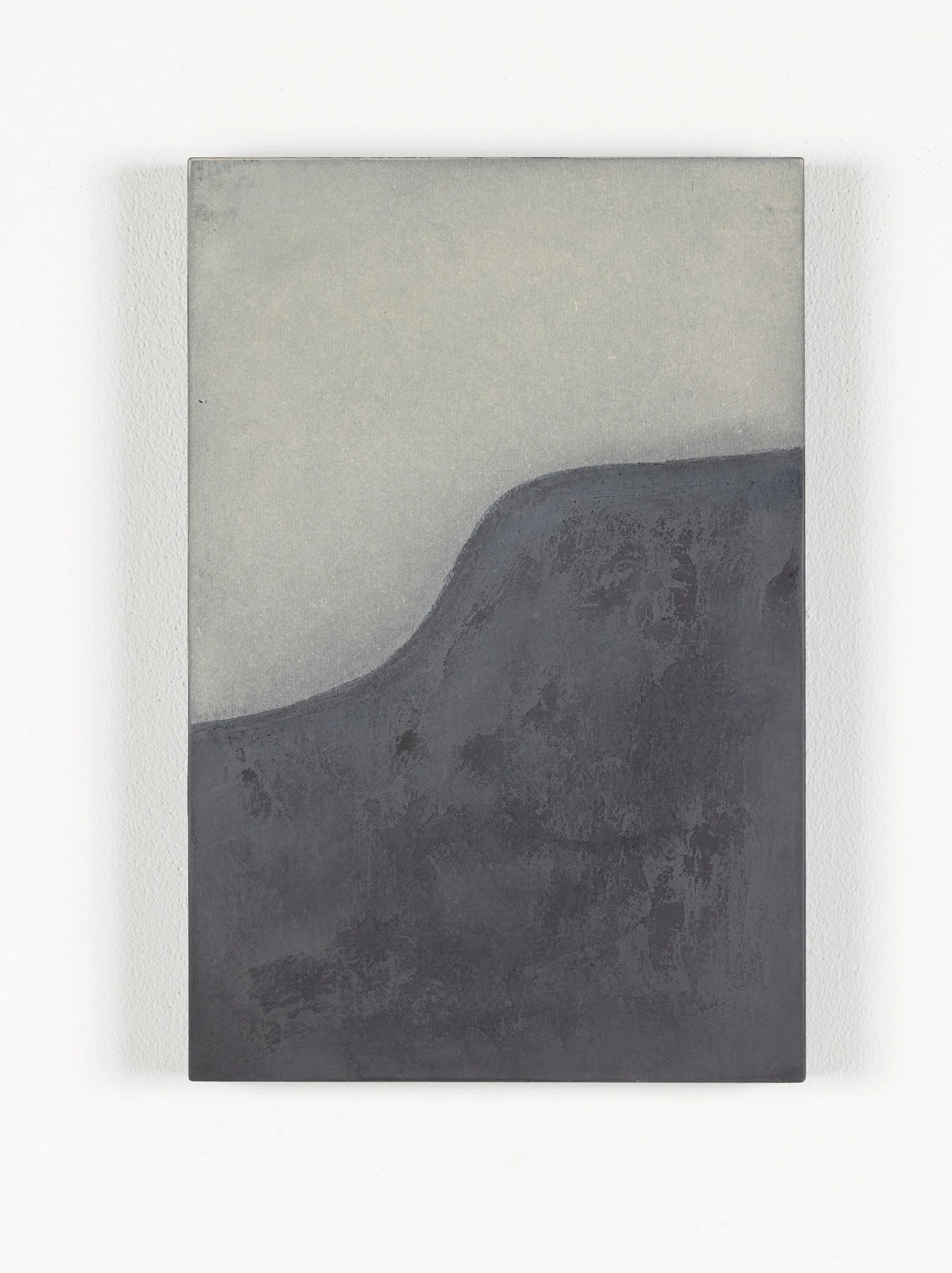 A black and white abstract artwork with a curved shape in the lower right corner, featuring textured and gradient shading.