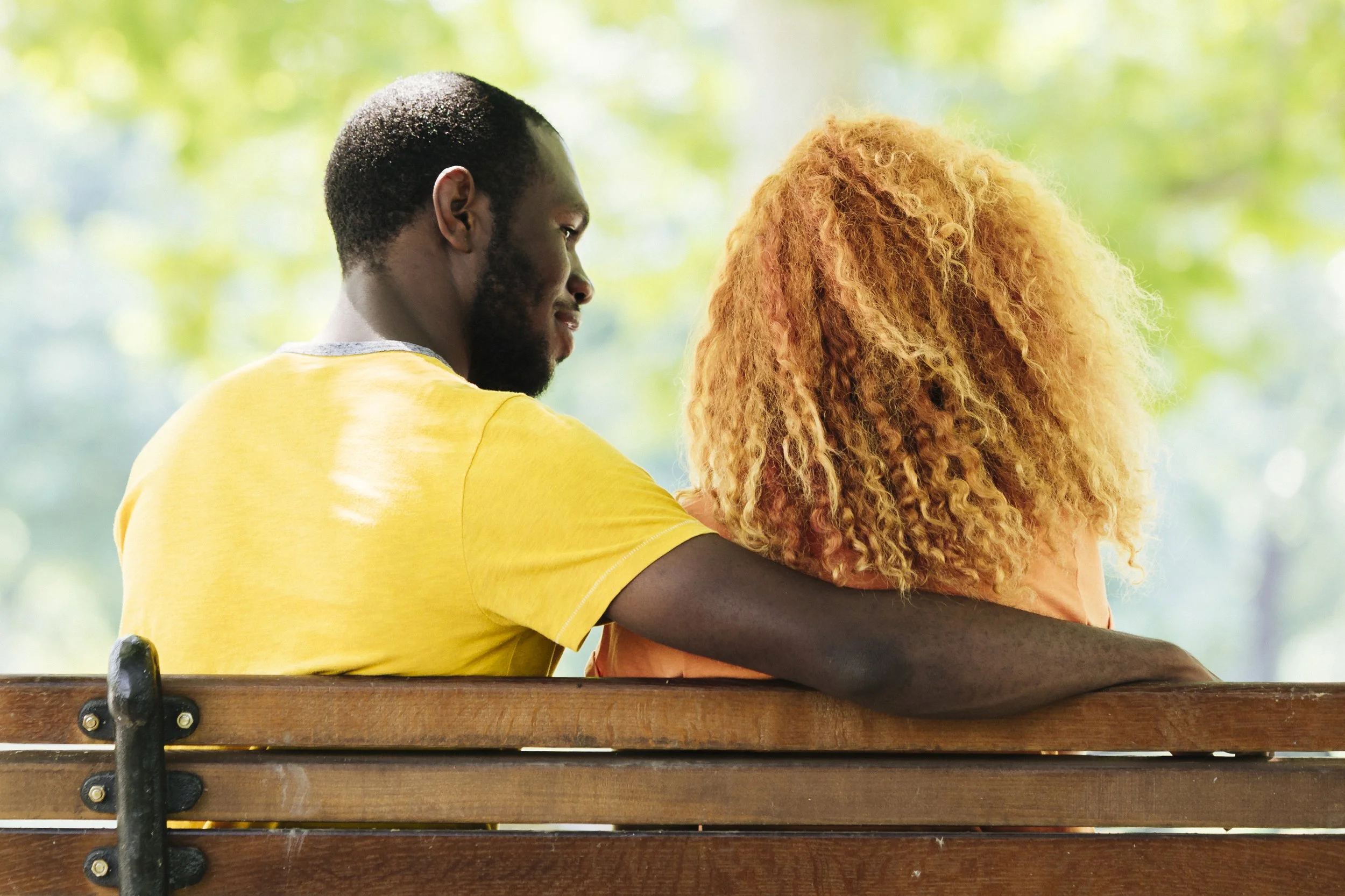 Black Couple sitting on a bench|Happy from Marriage counseling NJ|Stevette Heyliger LPC