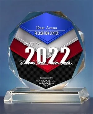 A clear glass award trophy with a blue, silver, red, and black design, inscribed with "Dart Arena Recreation Center Best of 2022 West-Chester Township," presented by Town of West Chester Recreation Department.