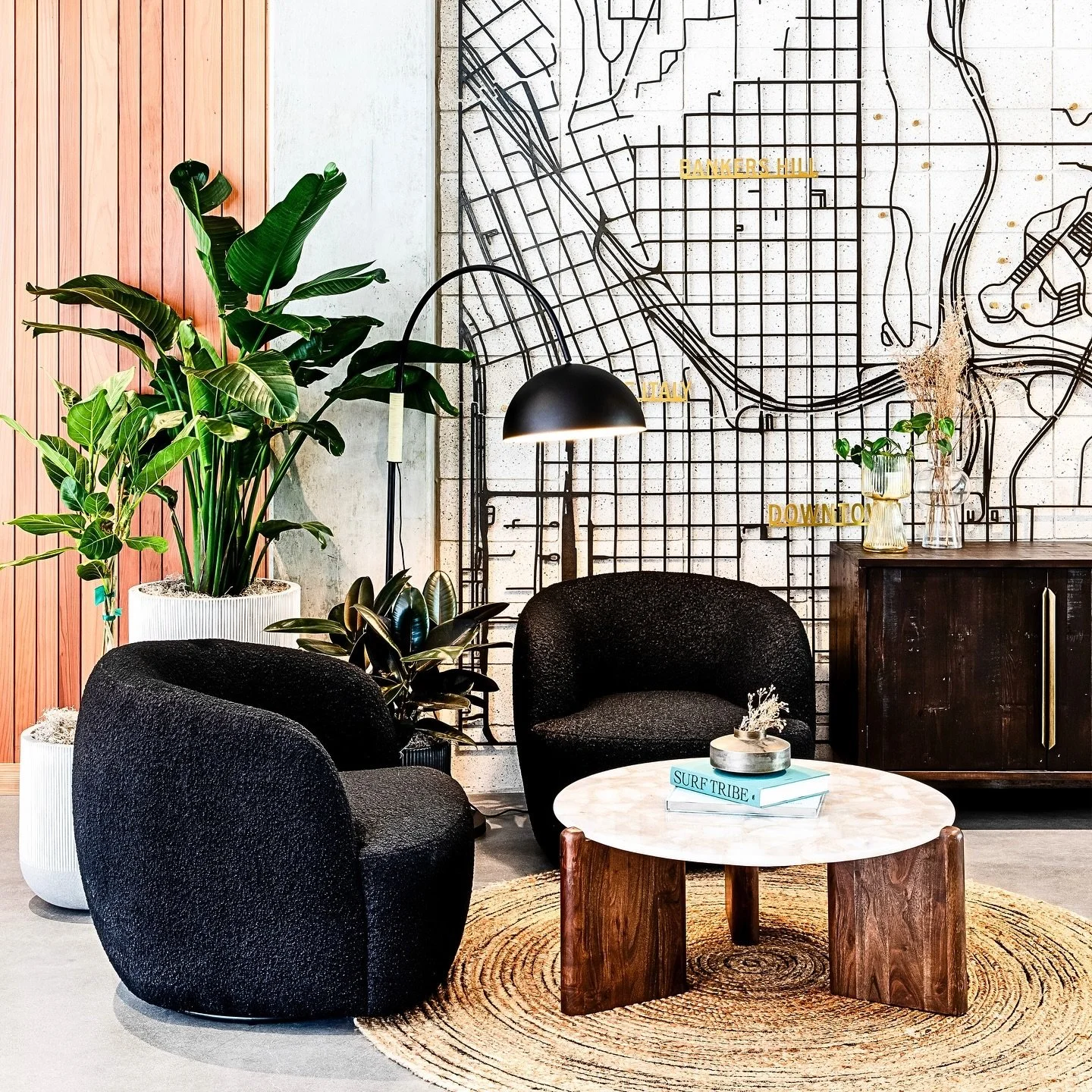 The palette of this project takes inspiration from the calming cool colors of the Pacific and juxtaposes that with the rough natural texture of concrete and steel that make up the primary structure of this modern building. To further tie the interior