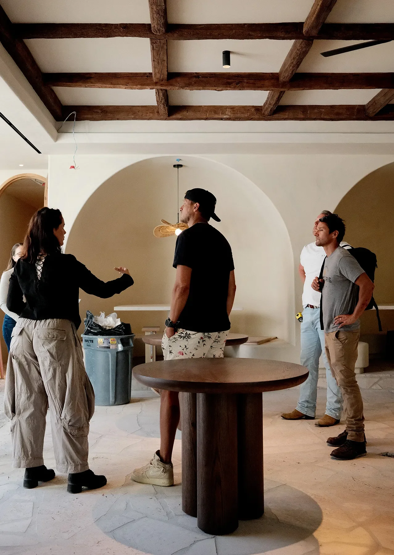 A site walk in the arched dinning room at By The Sea while the flagstone floor was still bare