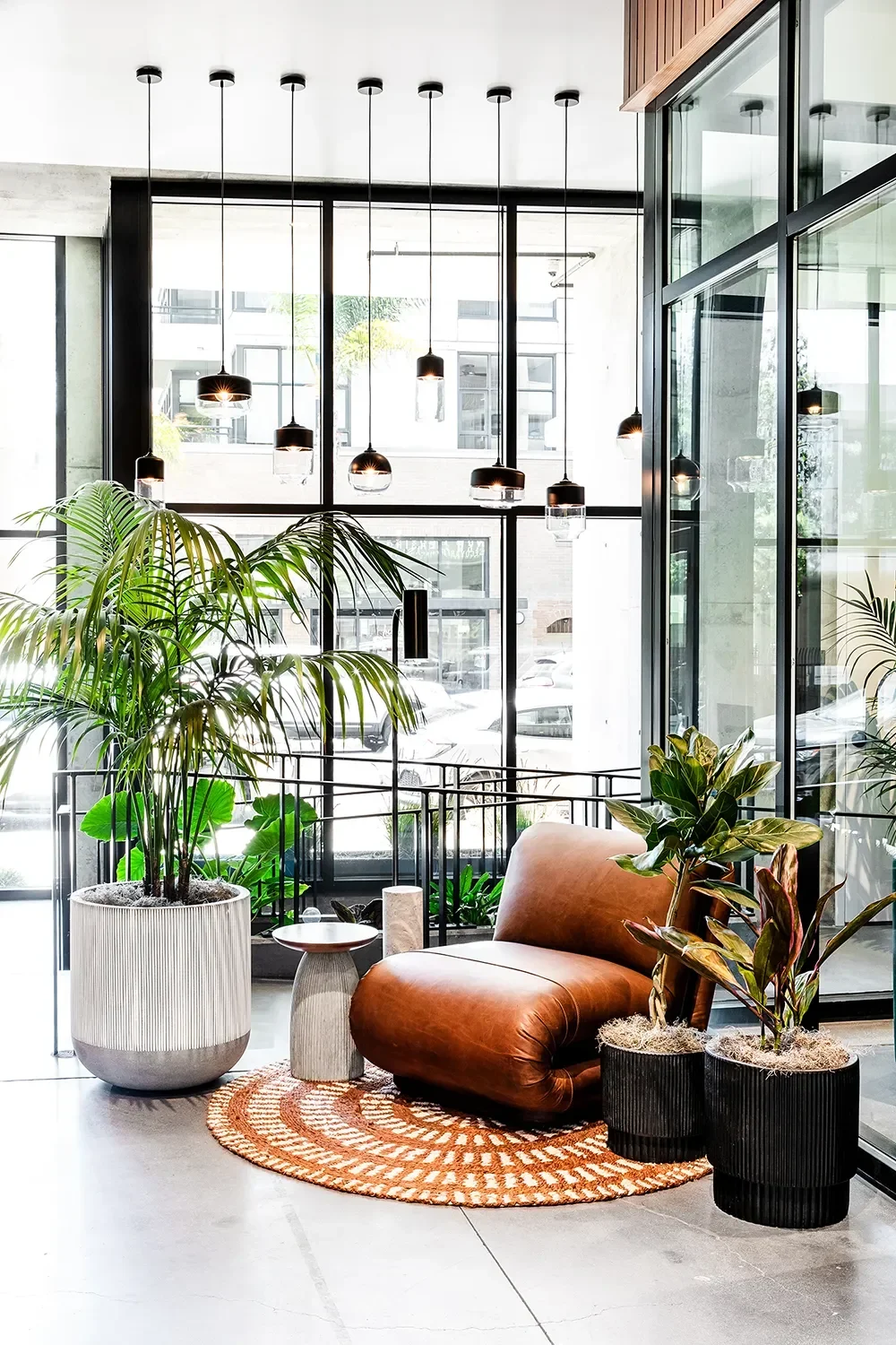 secoya-by-the-park-double-height-lobby-window-wall.webp