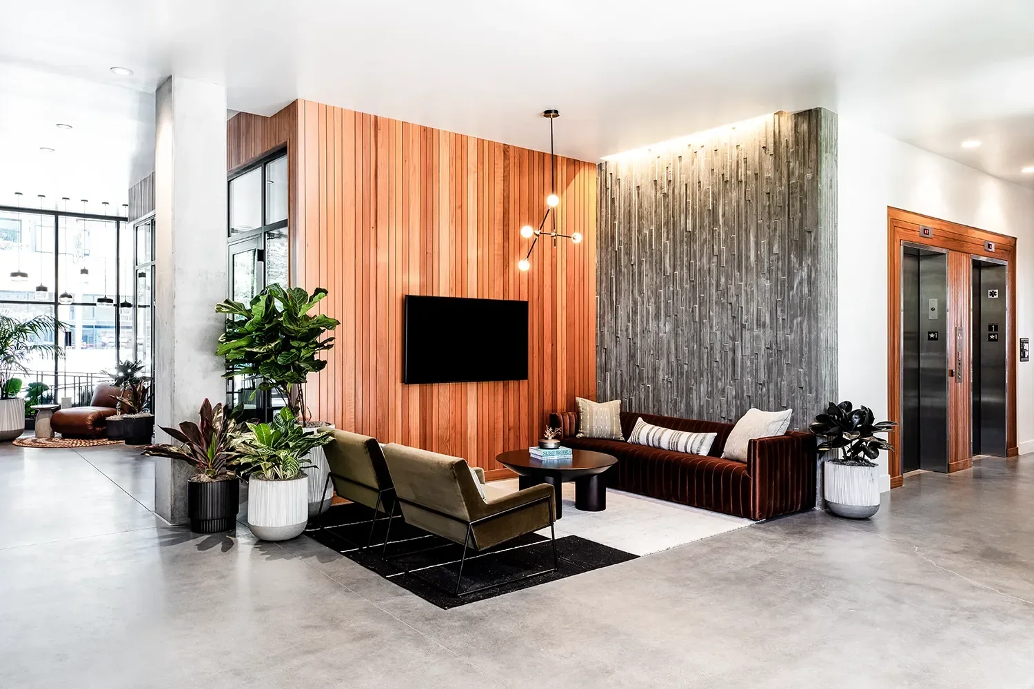 secoya-by-the-park-lobby-cedar-slat-stone-feature.webp