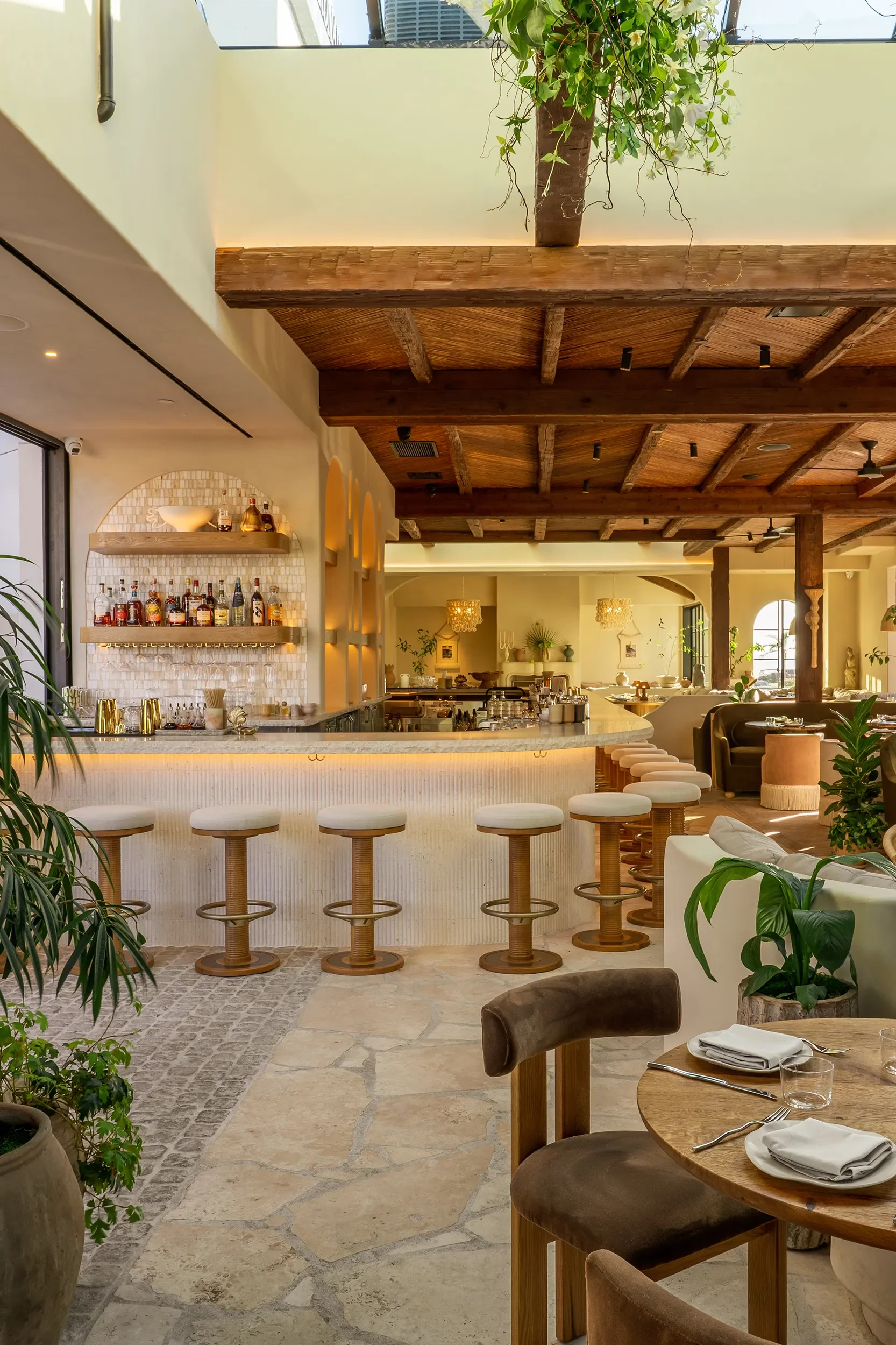 Side view of the central bar and dining room at By The Sea in Coronado